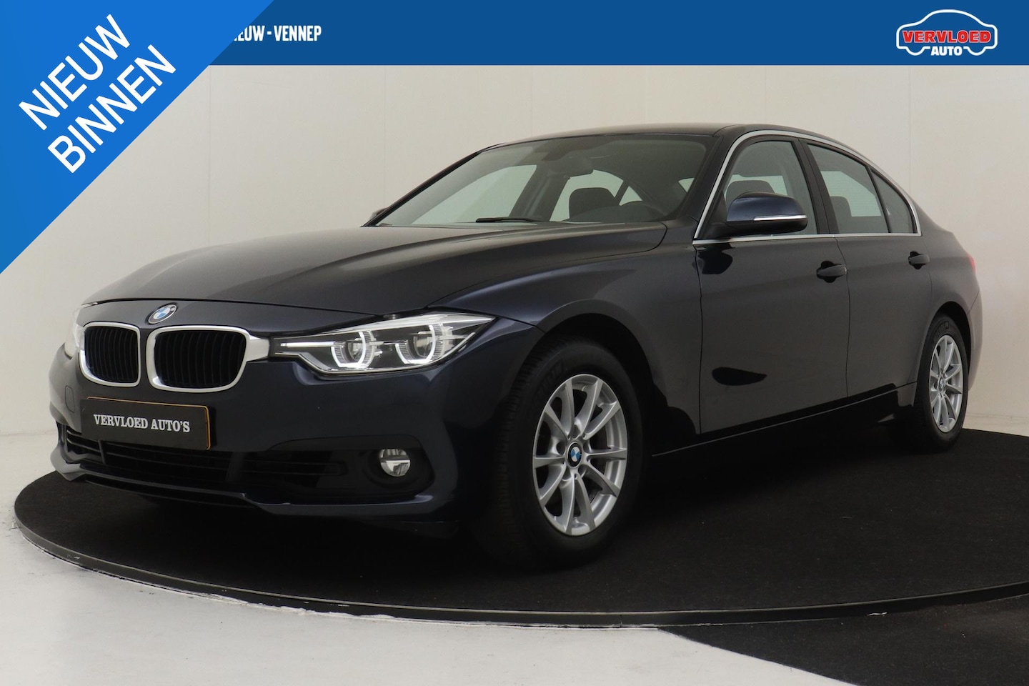 BMW 3-serie - 318I AUT. ADVANTAGE -CRUISE|PDC|NAVI|SPORTSTUUR|LED|16" - AutoWereld.nl