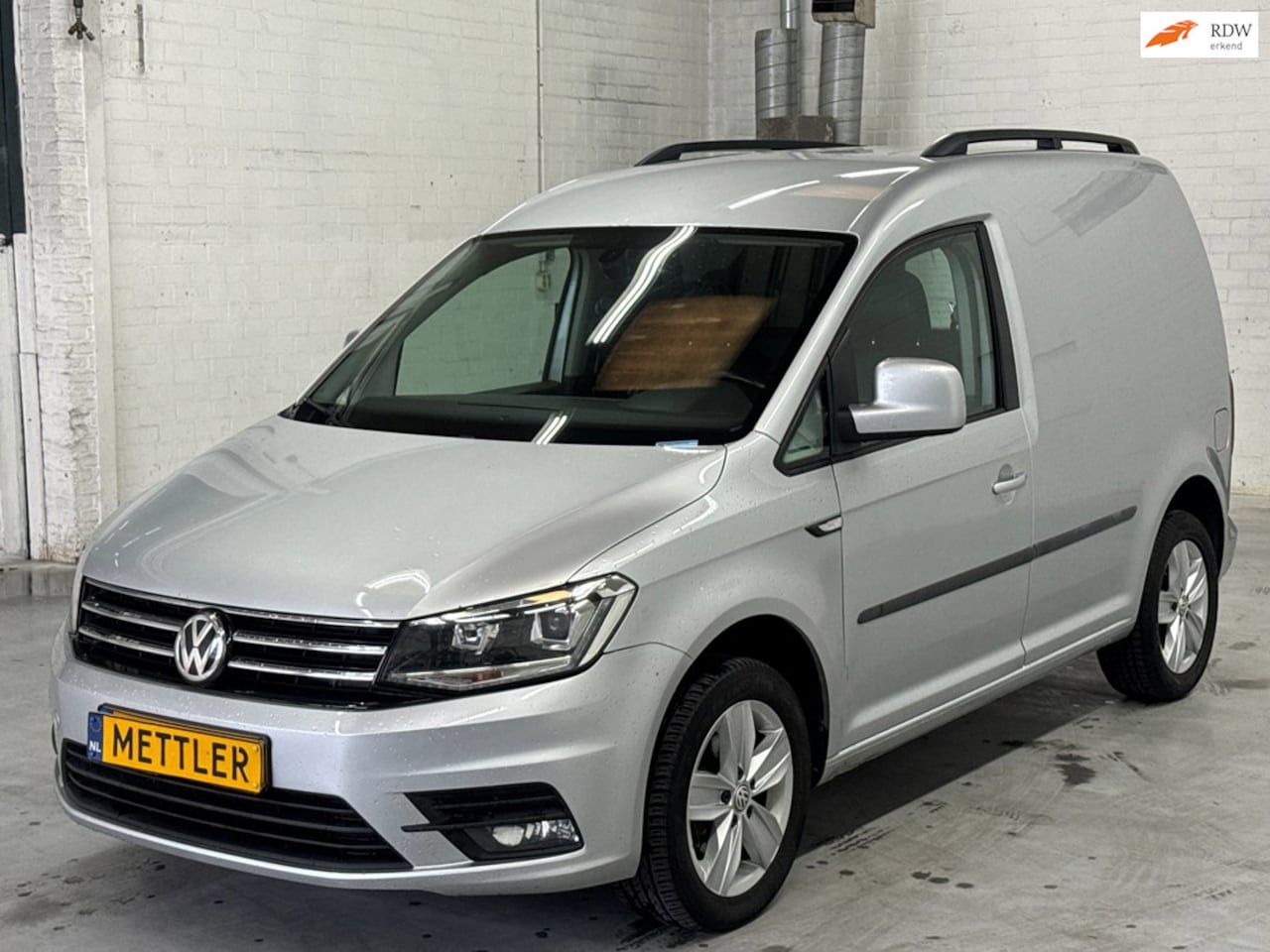 Volkswagen Caddy - 2.0 TDI L1H1 BMT Highline | Leder | Euro 6 | Navigatie | Cruise Control | Stoelverwarming - AutoWereld.nl