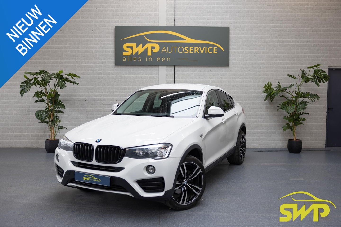 BMW X4 - xDrive20d | Navi | Camera | Leer en memory | NAP auto - AutoWereld.nl