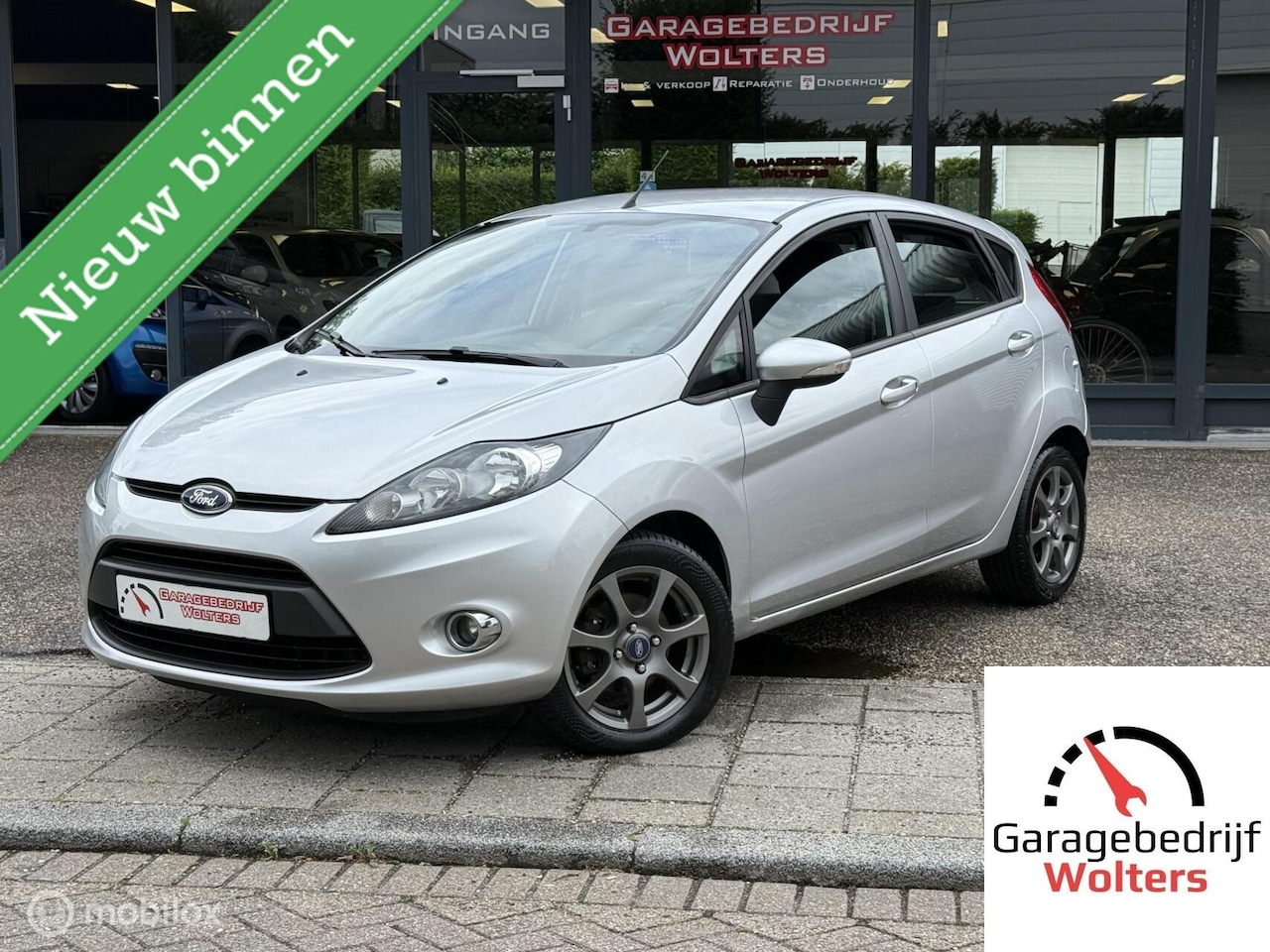 Ford Fiesta - 1.25 Titanium 82pk stoelverwarm. parksens. airco - AutoWereld.nl