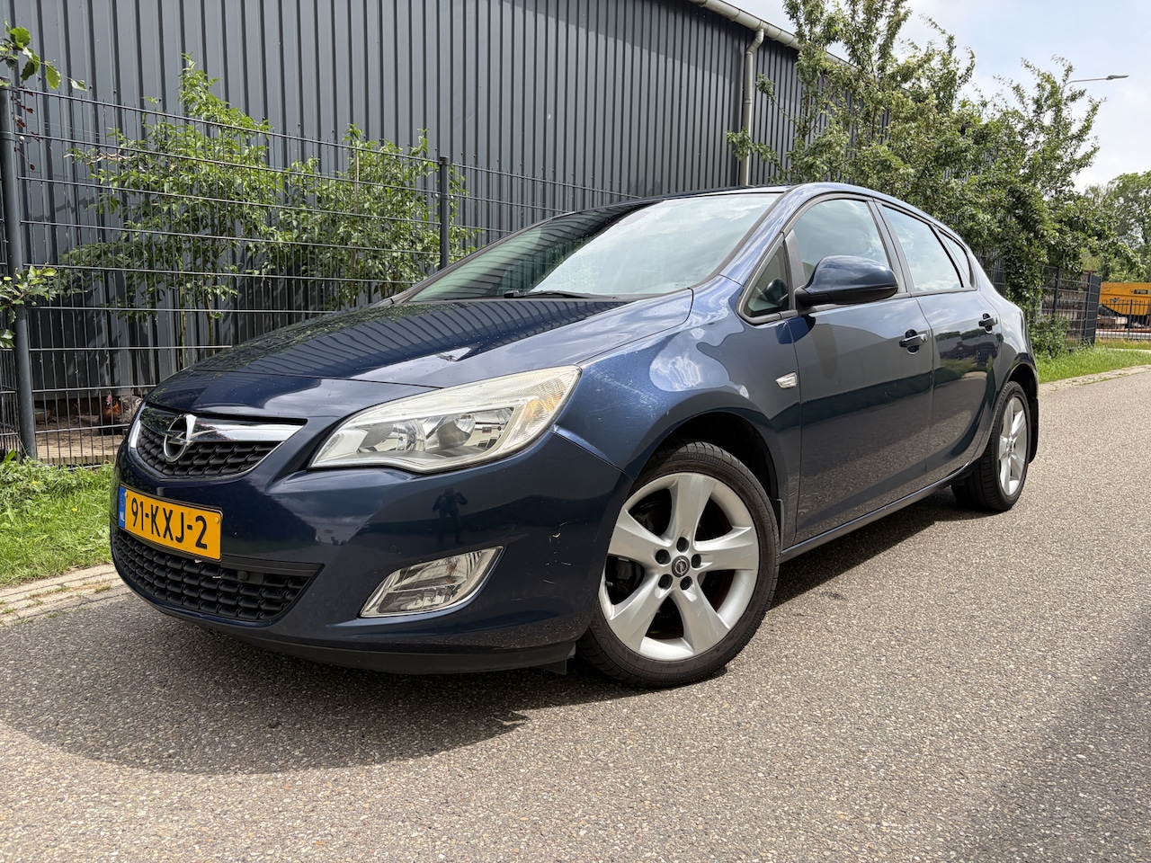 Opel Astra - 1.6 Edition / NAVI / AIRCO / CRUISE - AutoWereld.nl