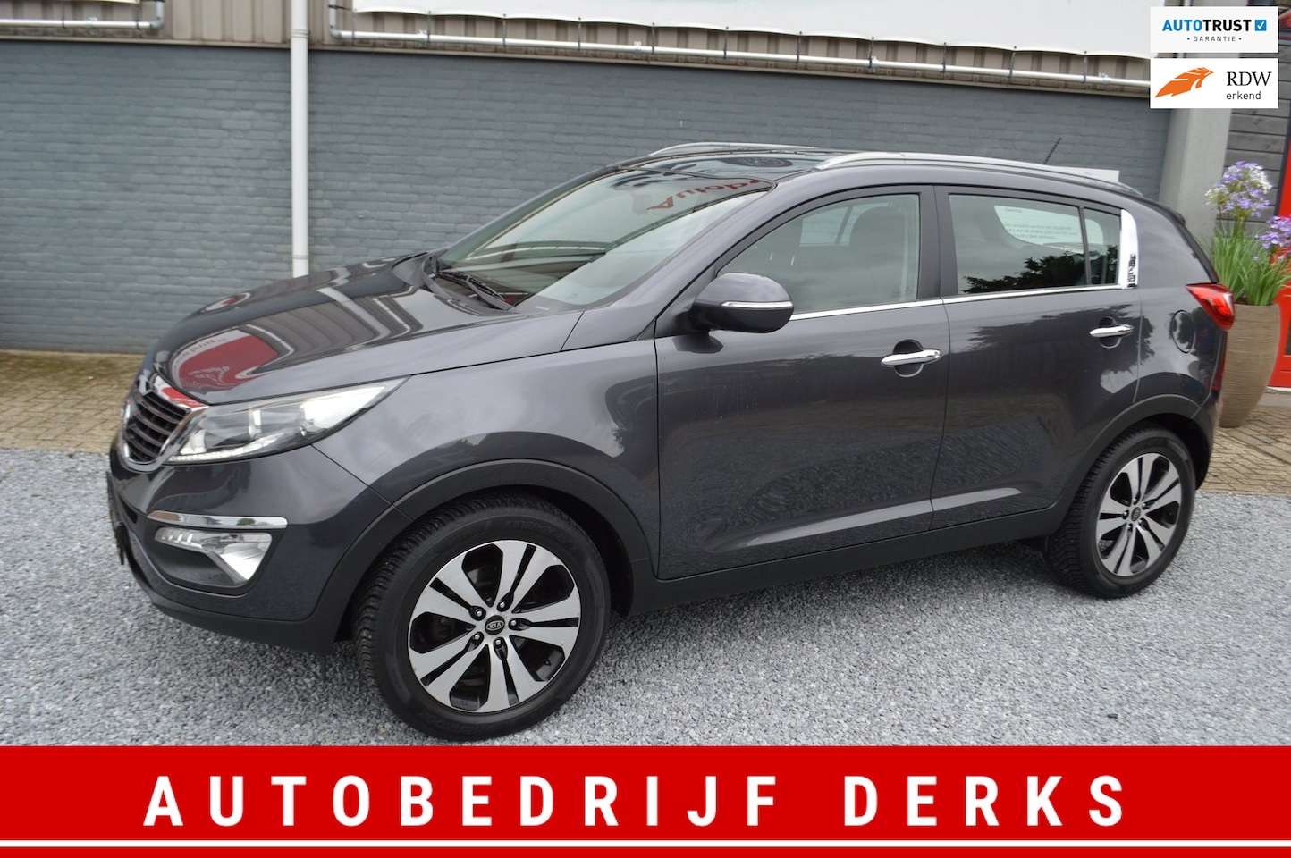 Kia Sportage - 2.0 X-ecutive Automaat Airco Navi 4X4 Trekhaak - AutoWereld.nl