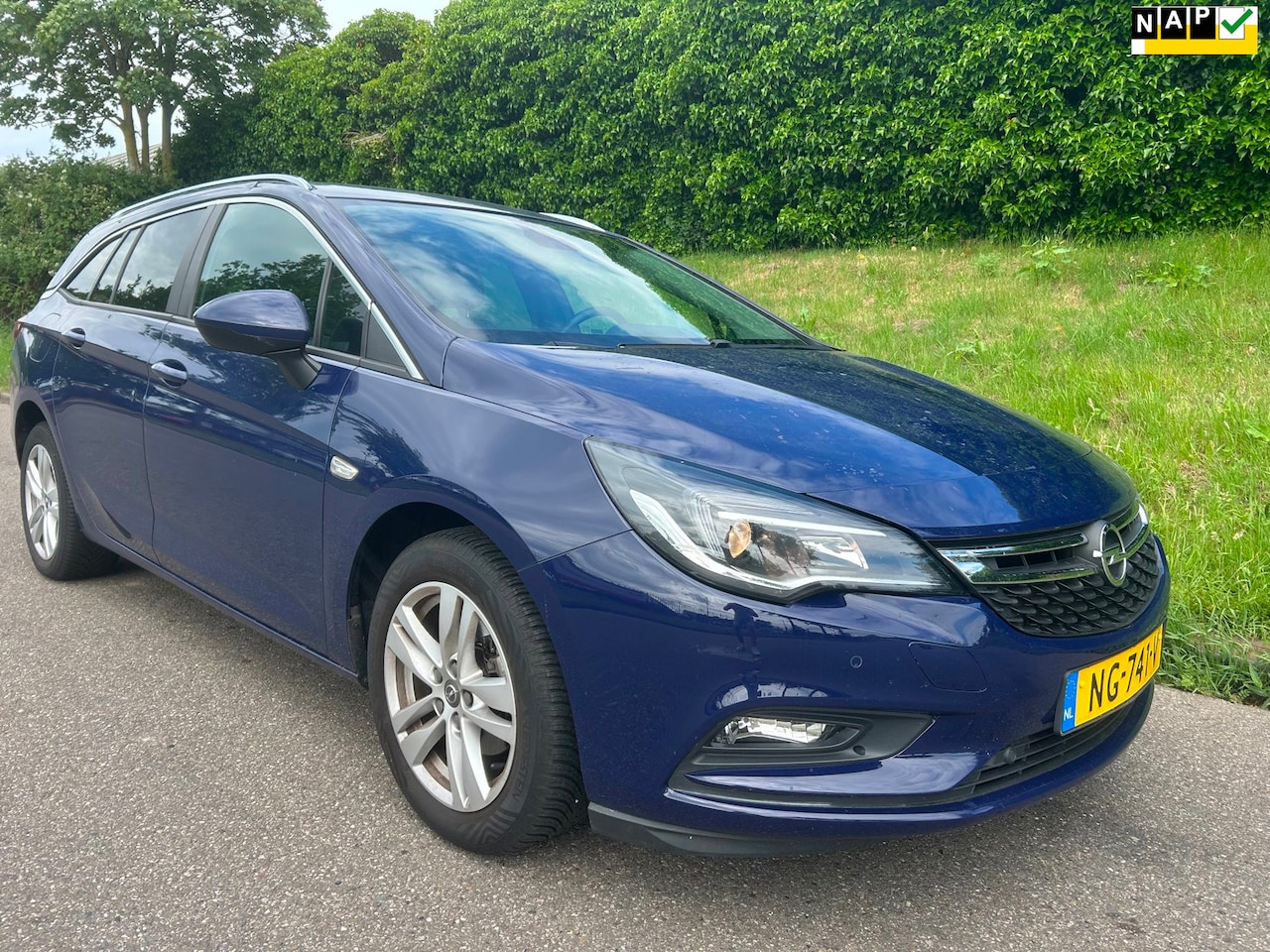 Opel Astra Sports Tourer - 1.0 Business+ Navi - Airco - Cruise - PDC - Trekhaak - AutoWereld.nl
