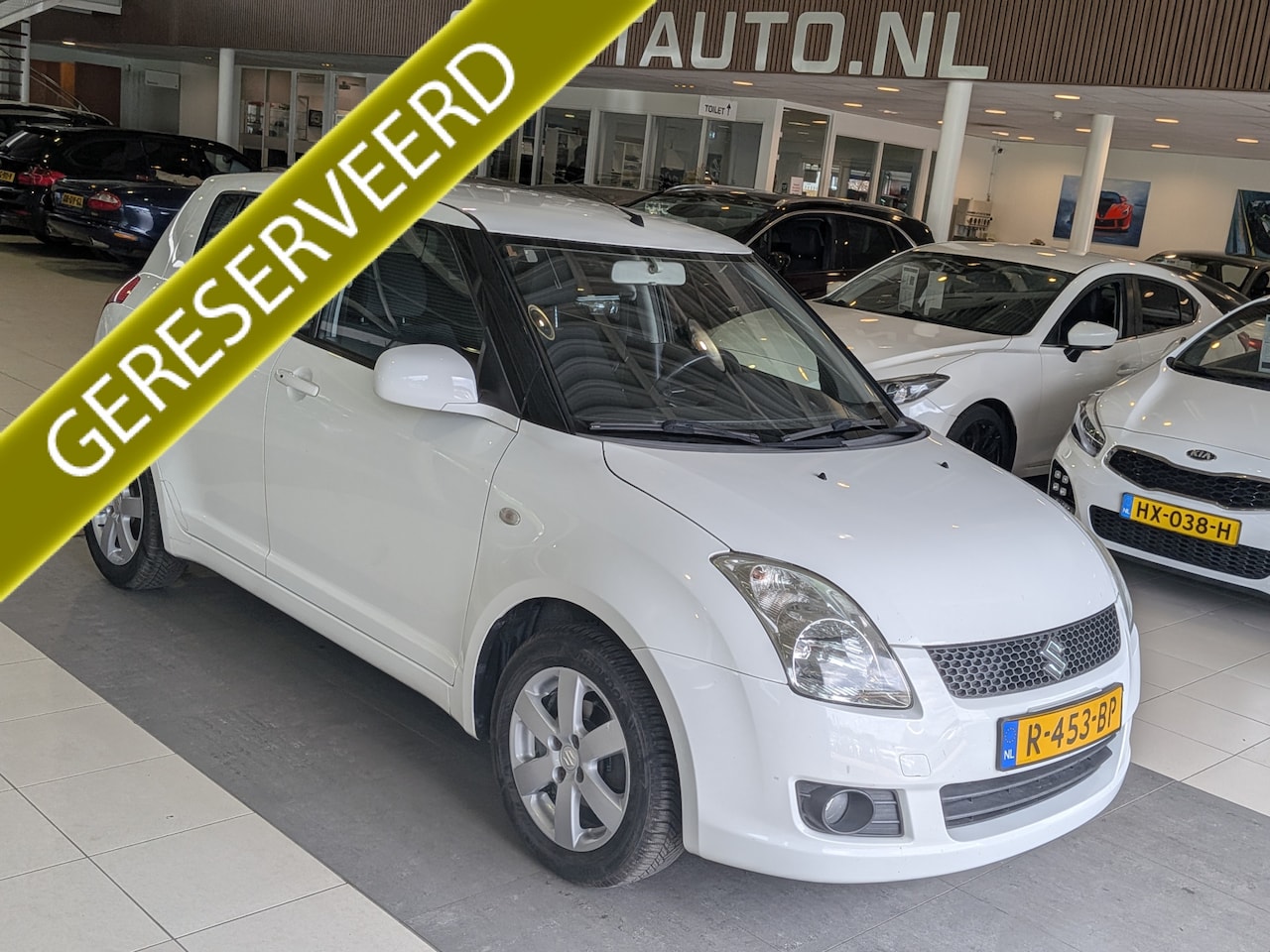 Suzuki Swift - 1.3 Comfort Airco, Stuurbekrachtiging - AutoWereld.nl