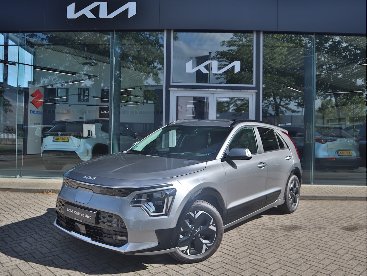 Kia Niro EV - ExecutiveLine 64.8 kWh 6.330km! | Navigatie | Leder | Schuifdak | Stoel/Stuurverwarming | - AutoWereld.nl