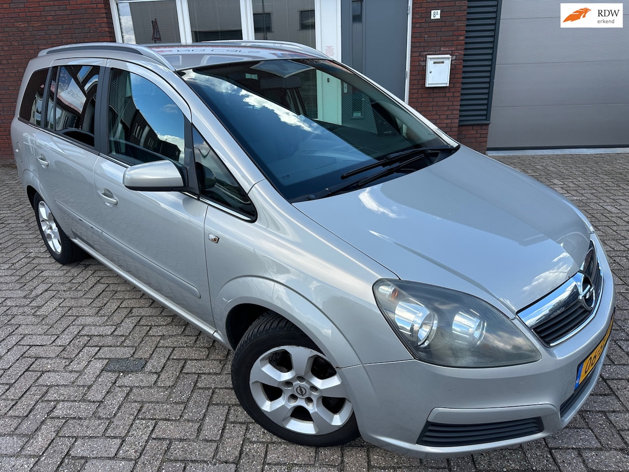 Opel Zafira - 1.6 Enjoy / 7P / Airco / Navi / Cruise / LM / Schermpje - AutoWereld.nl