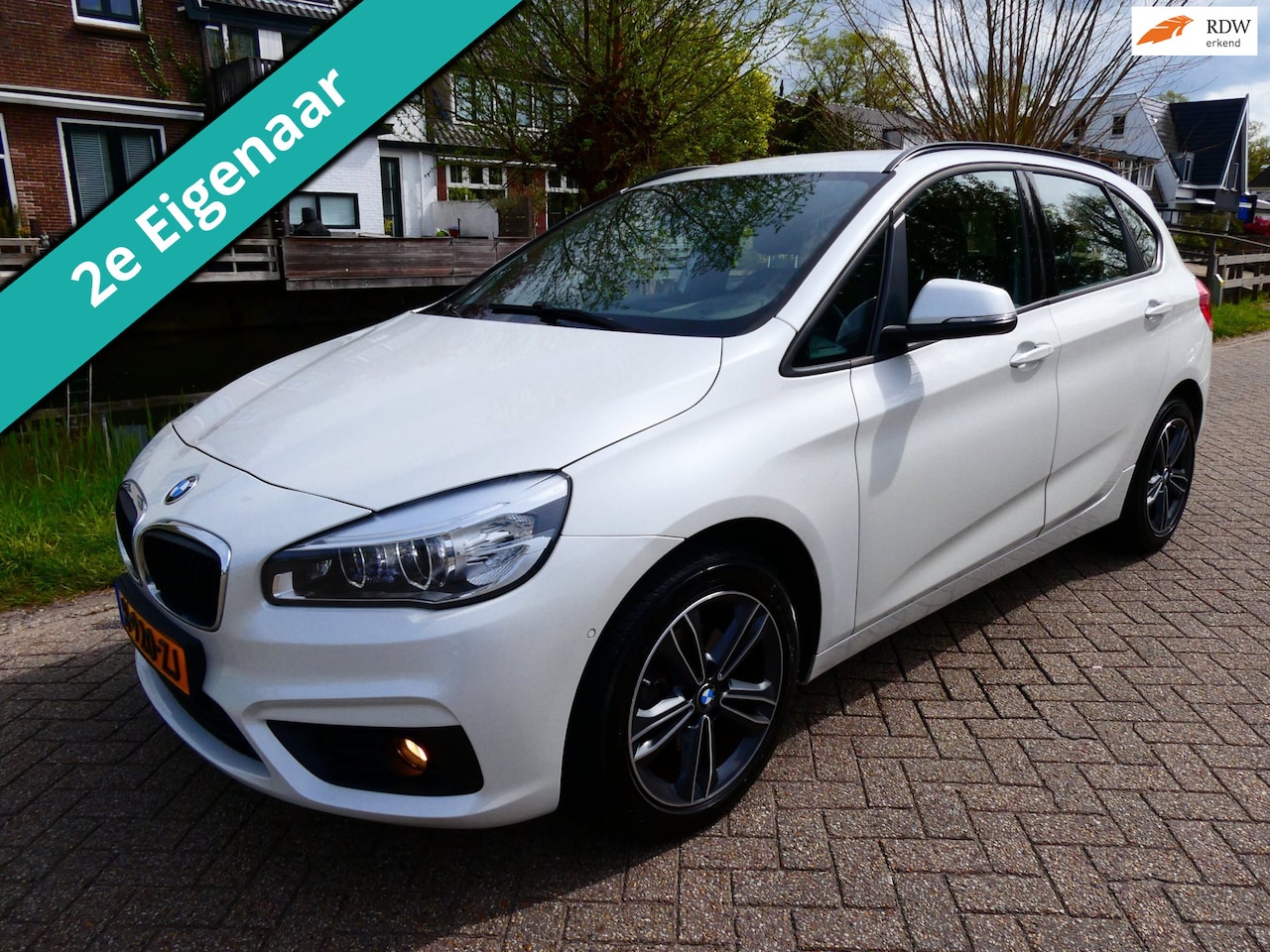 BMW 2-serie Active Tourer - 218i High Exe 136pk Automaat 2e eig. Leder Navi - AutoWereld.nl
