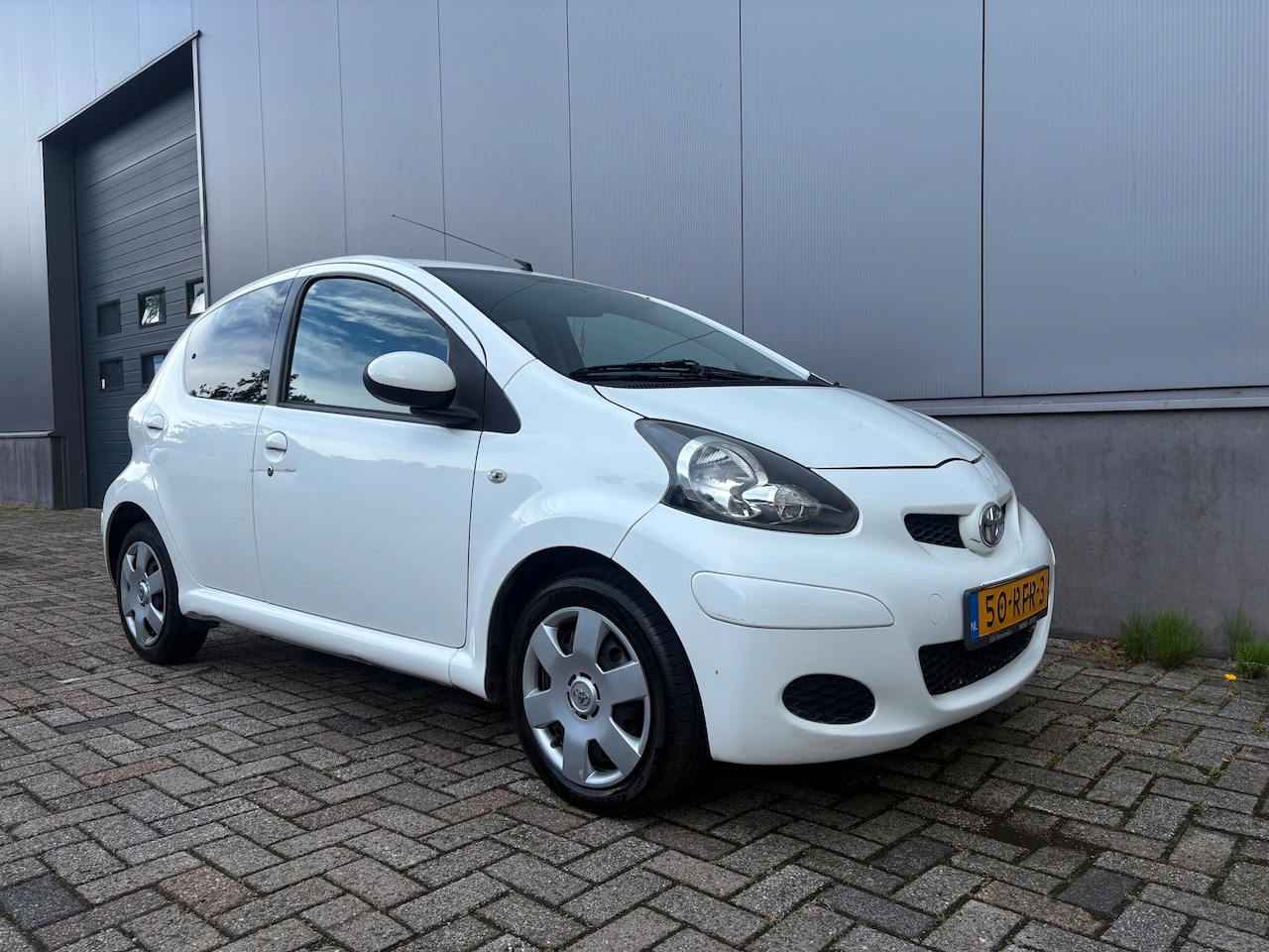 Toyota Aygo - 1.0-12V Dynamic|Airco|NAP|Elektrisch pakket - AutoWereld.nl
