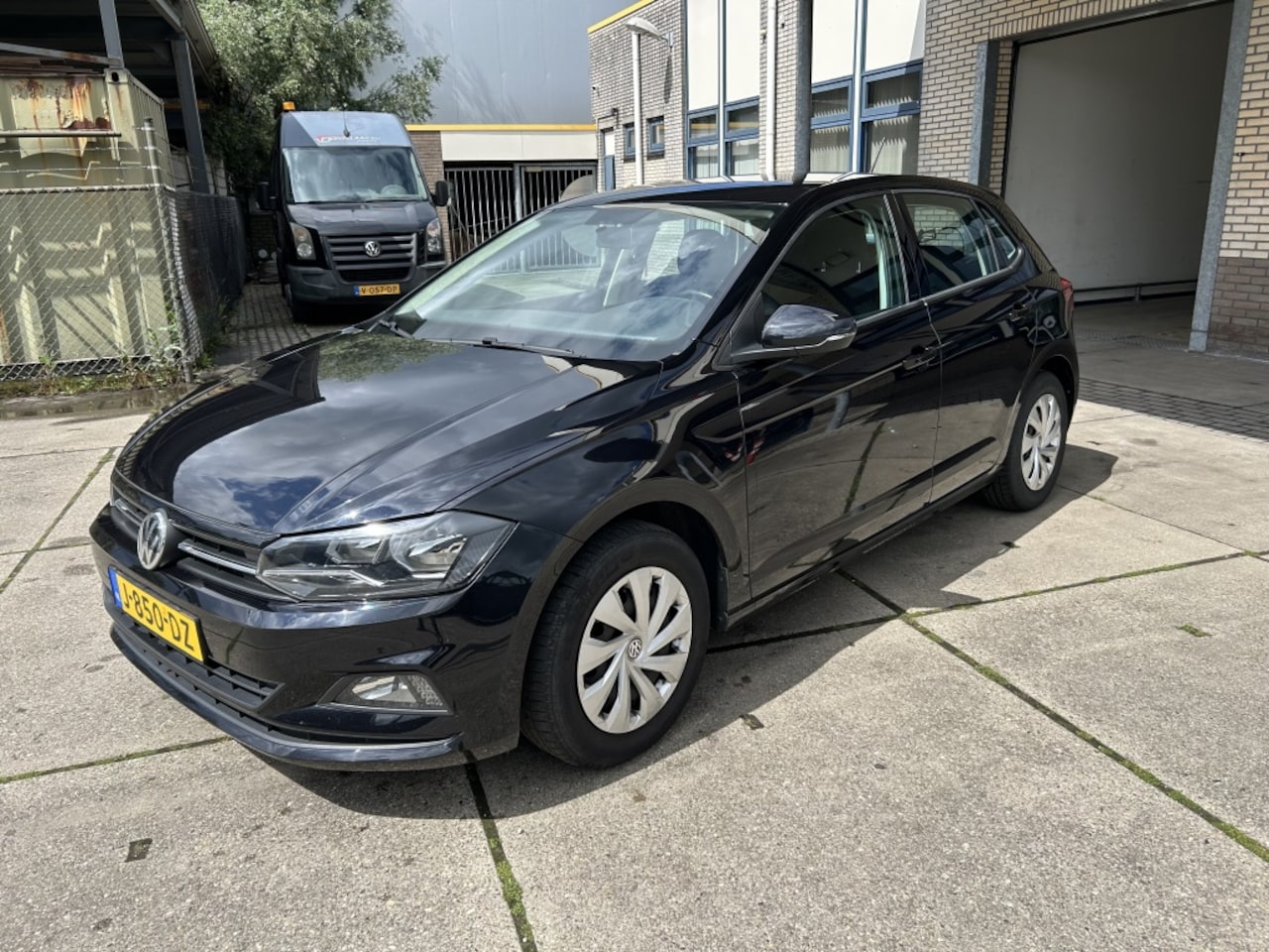 Volkswagen Polo - 1.0 TSI Comfortline NAVI ZWART - AutoWereld.nl