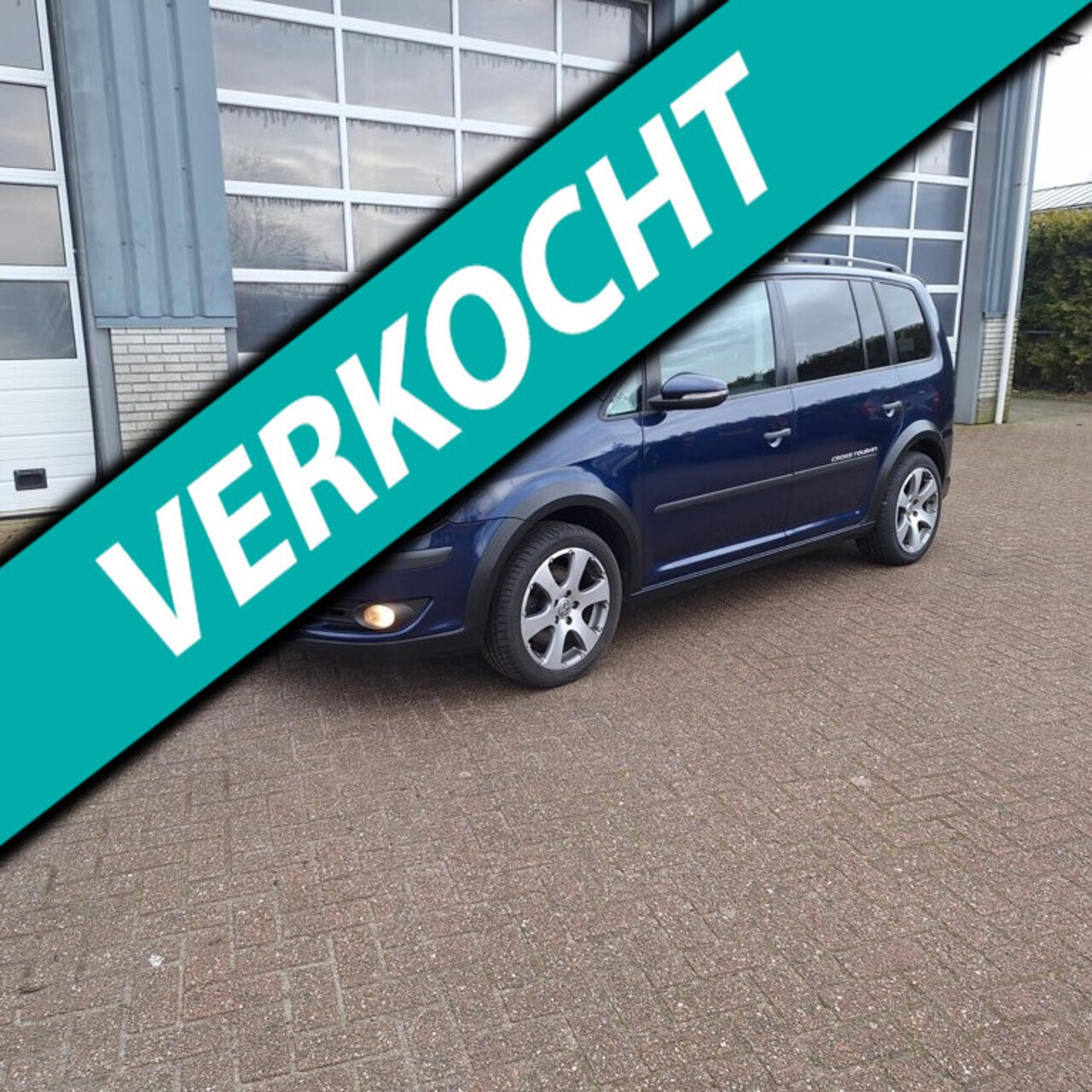 Volkswagen Touran Cross - 1.4 TSI Met volledige motorrevisie - AutoWereld.nl