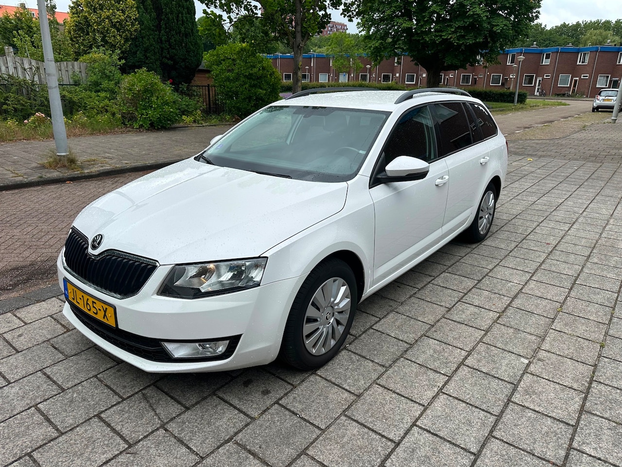 Skoda Octavia Combi - 1.2 TSI Automaat Greentech Ambition NW APK Snow White - AutoWereld.nl