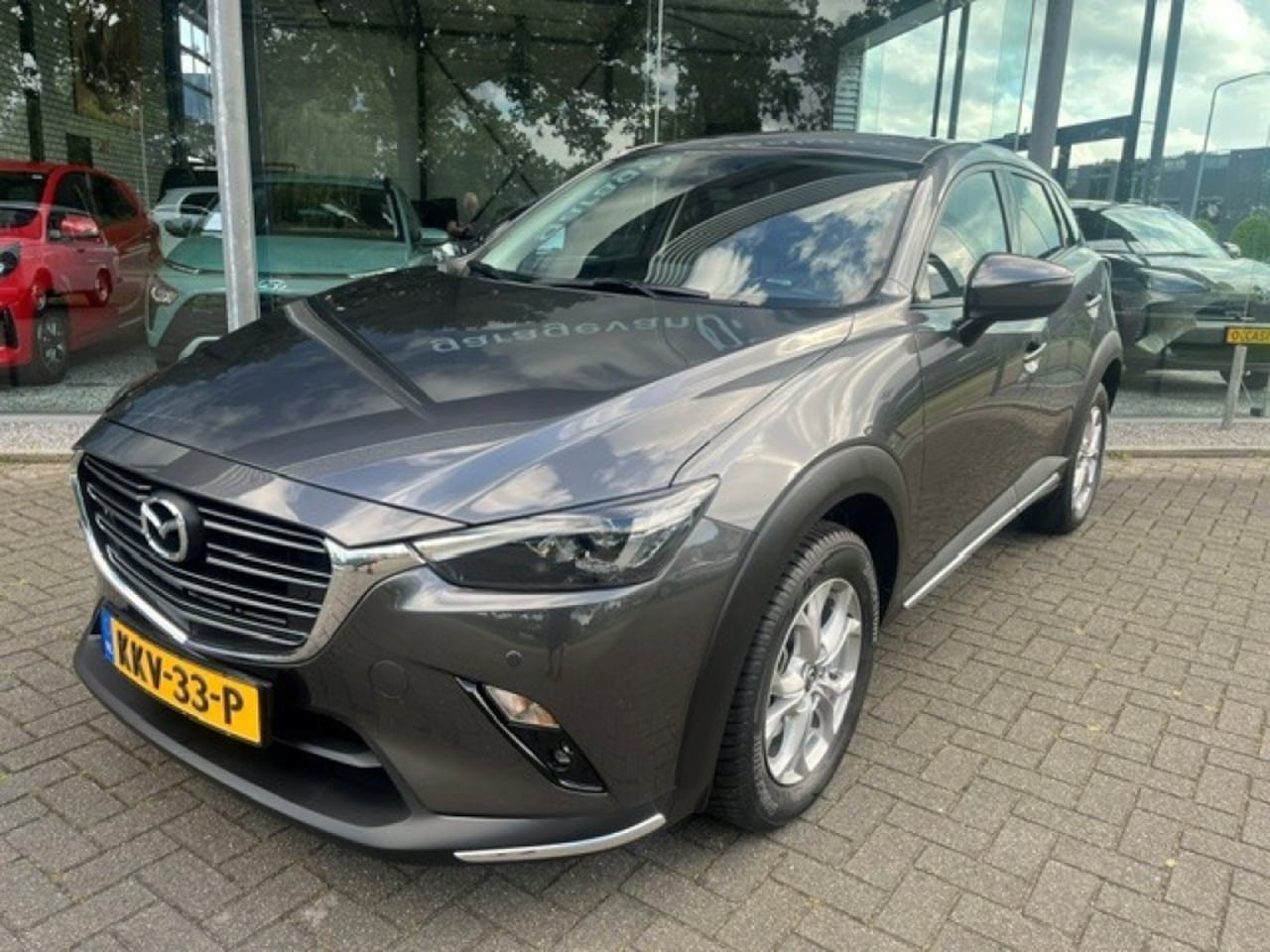 Mazda CX-3 - 2.0 SKYACTIVE-G Edition 100 AUTOMAAT LEER NAVI CAMERA CARPLAY - AutoWereld.nl