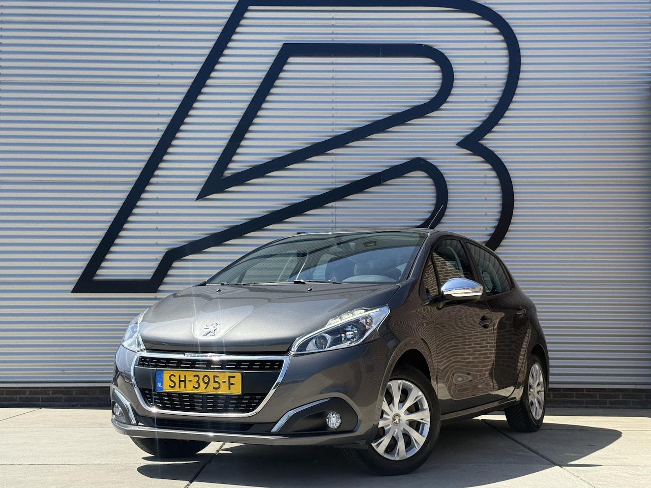 Peugeot 208 - 1.2 PureTech Blue Lion Navi|Carplay|Airco|Cruise|PDC|N.A.P|APK tot 09-2026 - AutoWereld.nl