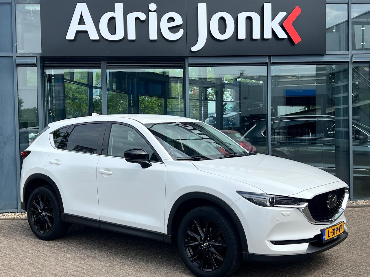 Mazda CX-5 - 2.0 SkyActiv-G 165 Sportive AUTOMAAT | WEGKLAPBARE TREKHAAK | 360 CAMERA | LEDER/ALCANTARA - AutoWereld.nl