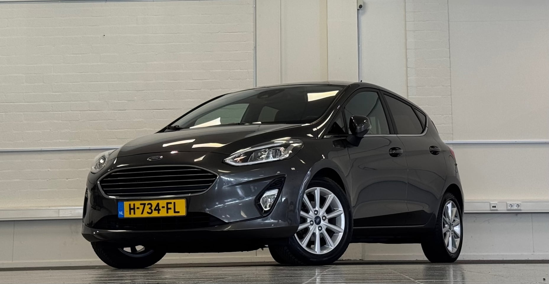 Ford Fiesta - 1.0 EcoBoost Titanium Garantie Clima PDC Android auto Mooi! - AutoWereld.nl