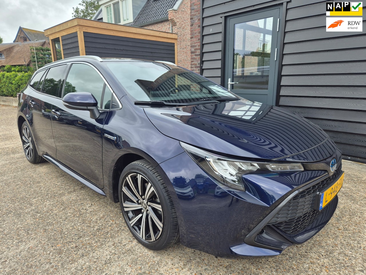 Toyota Corolla Touring Sports - 1.8 Hybrid Dynamic *Half Leder, Stoelverwarming* - AutoWereld.nl