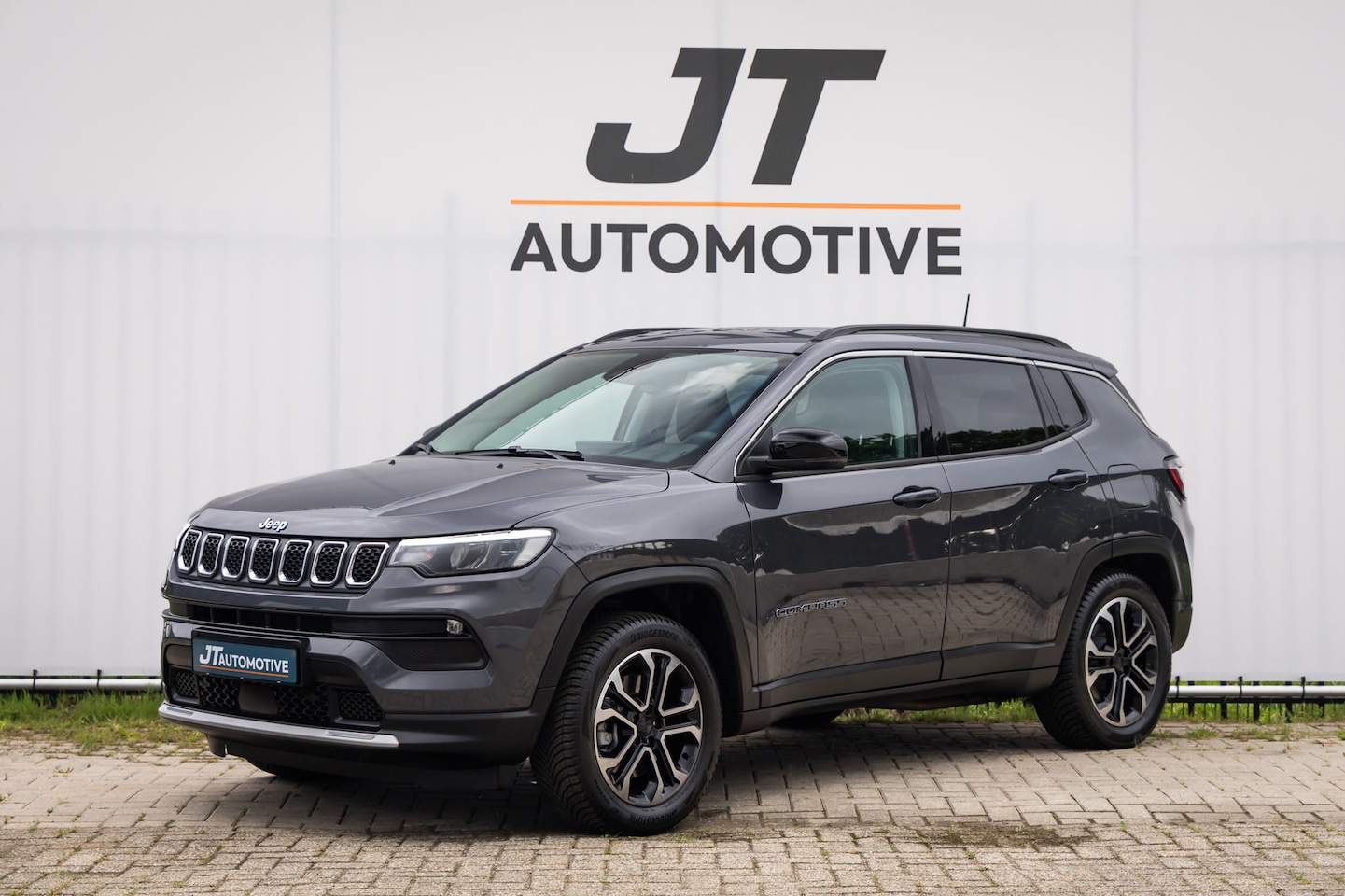 Jeep Compass - 4xe 190 plug in Hyb N.Eagle Trekhaak | Adaptive cruise | PDC | Camera | Half ledere bekled - AutoWereld.nl