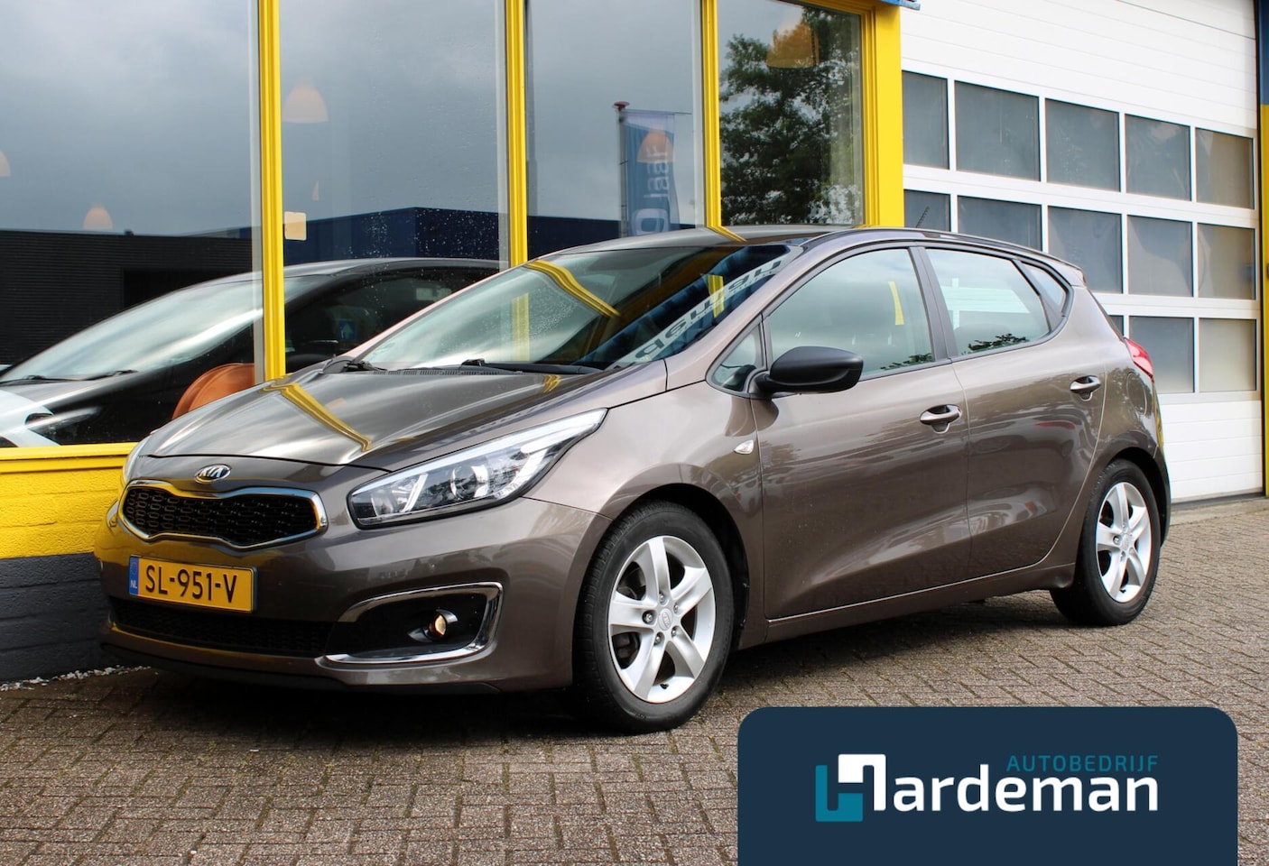 Kia Cee'd - 1.4 CVVT Navi Airco Trekhaak - AutoWereld.nl