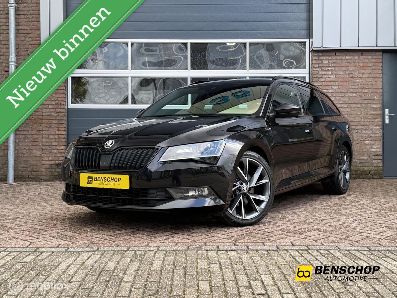 Skoda Superb Combi - 1.8 TSI Sportline Kuipstoelen Navi Carplay Memory Alcantara - AutoWereld.nl