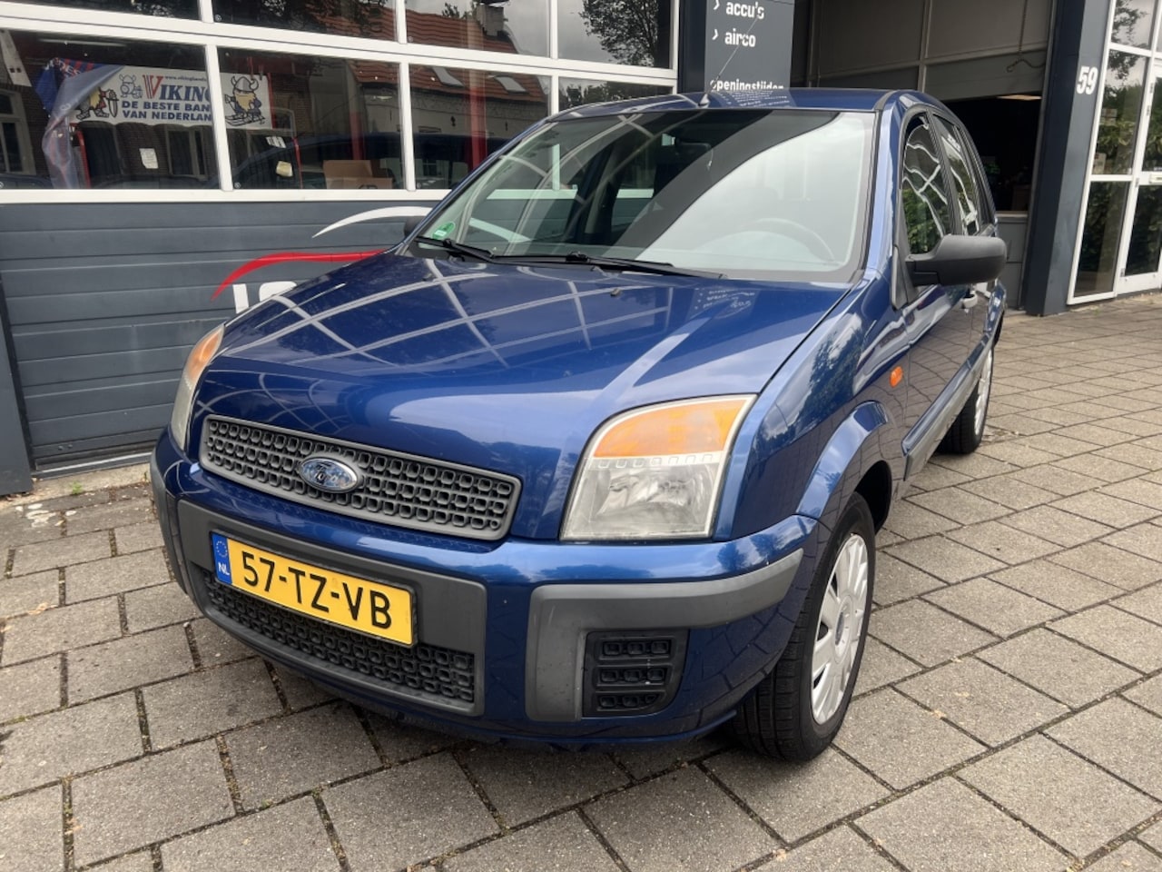 Ford Fusion - 1.4-16V Champion Airco 5 deurs - AutoWereld.nl