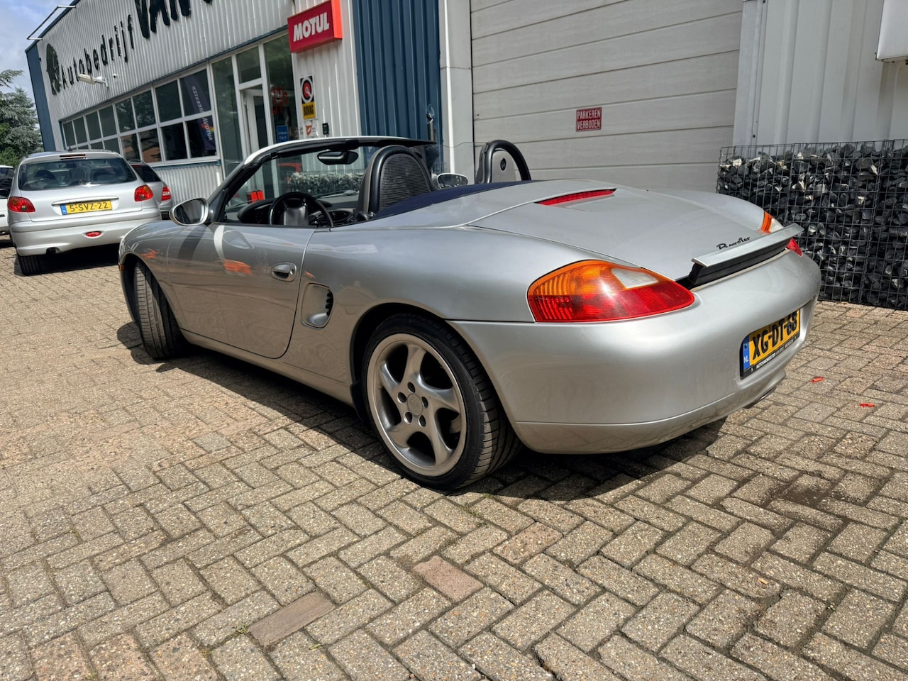 Porsche Boxster - 2.5 Tiptronic erg netjes, heeft nieuwe carbiokap - AutoWereld.nl