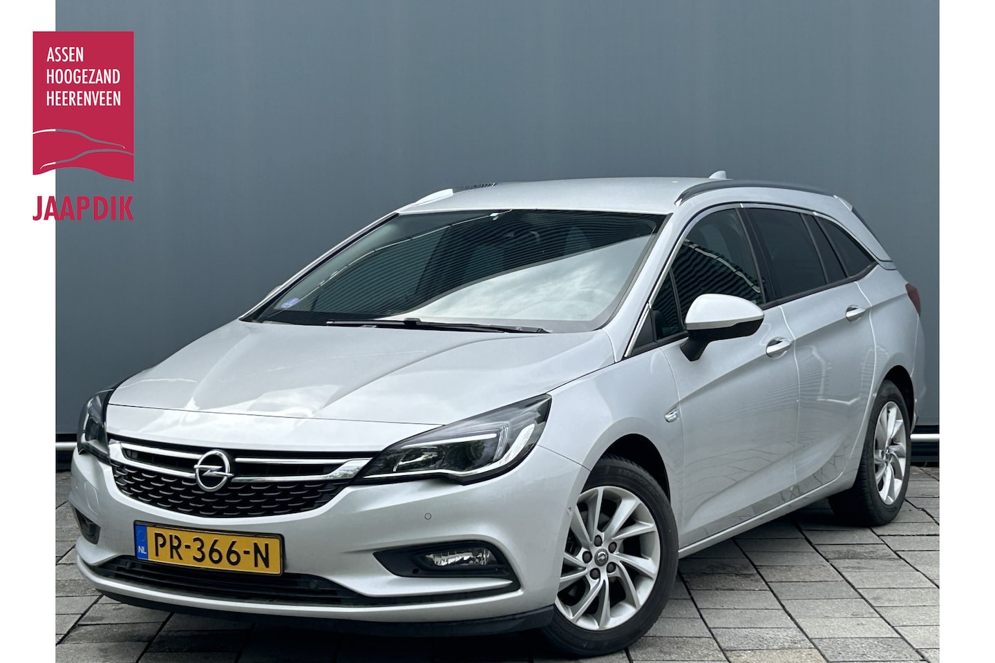 Opel Astra Sports Tourer - BWJ 2017 | 1.0 105PK Innovation | TREKHAAK | CAMERA A | CLIMA | NAVI | CRUISE | PDC | CARP - AutoWereld.nl