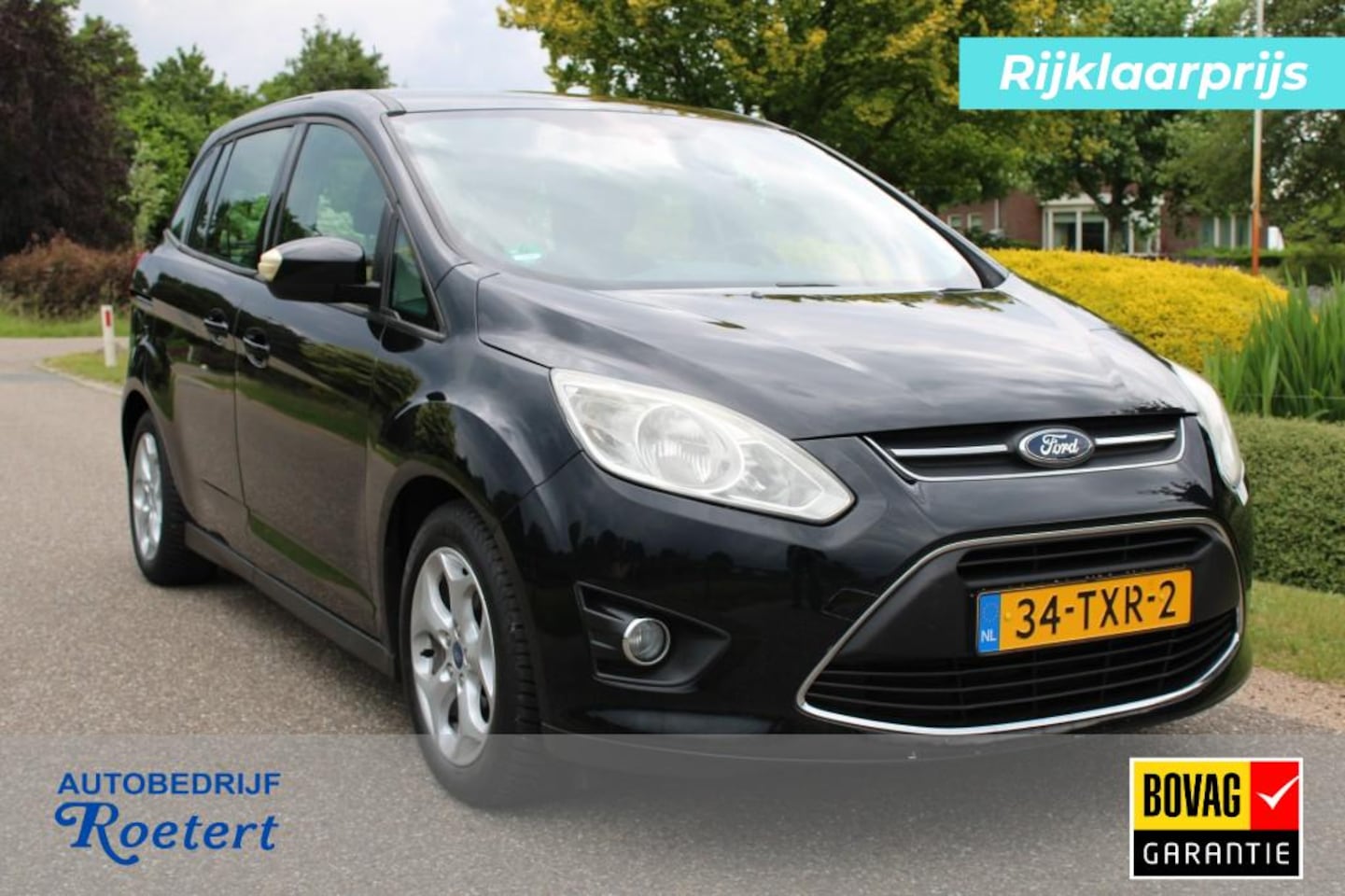 Ford Grand C-Max - 1.6 125pk Trend 7-persoons airco/cruise/trekhaak - AutoWereld.nl