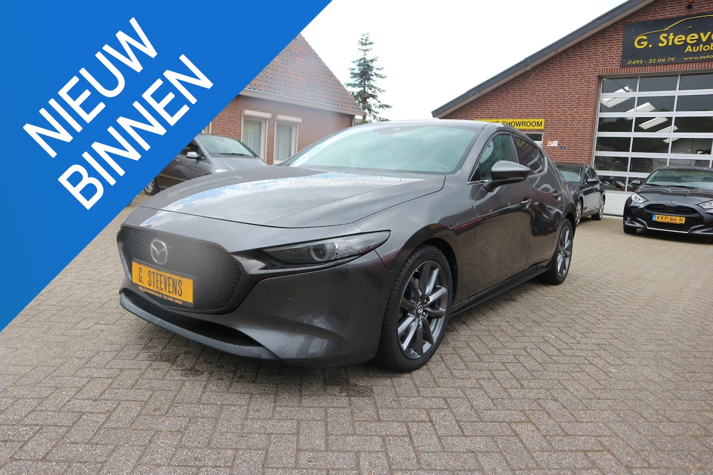 Mazda 3 - 2.0 e-SkyActiv-G M Hybrid 122 Luxury navigatie,leder - AutoWereld.nl