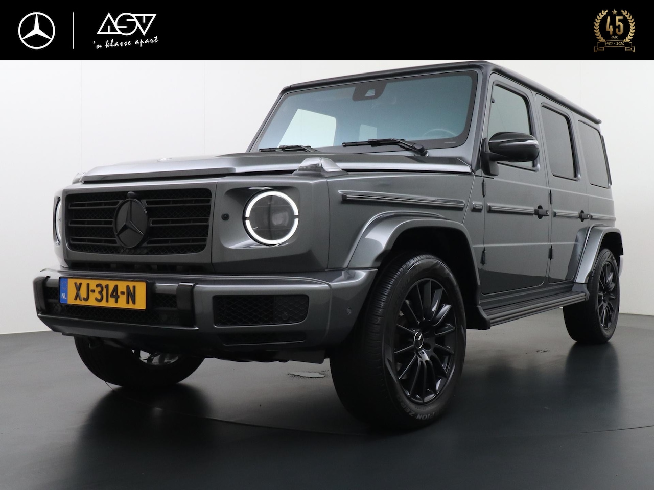 Mercedes-Benz G-klasse - 500 AMG-Line | Schuif - Kanteldak | Trekhaak | Massage Stoelen | Sportuitlaat | 360° Camer - AutoWereld.nl