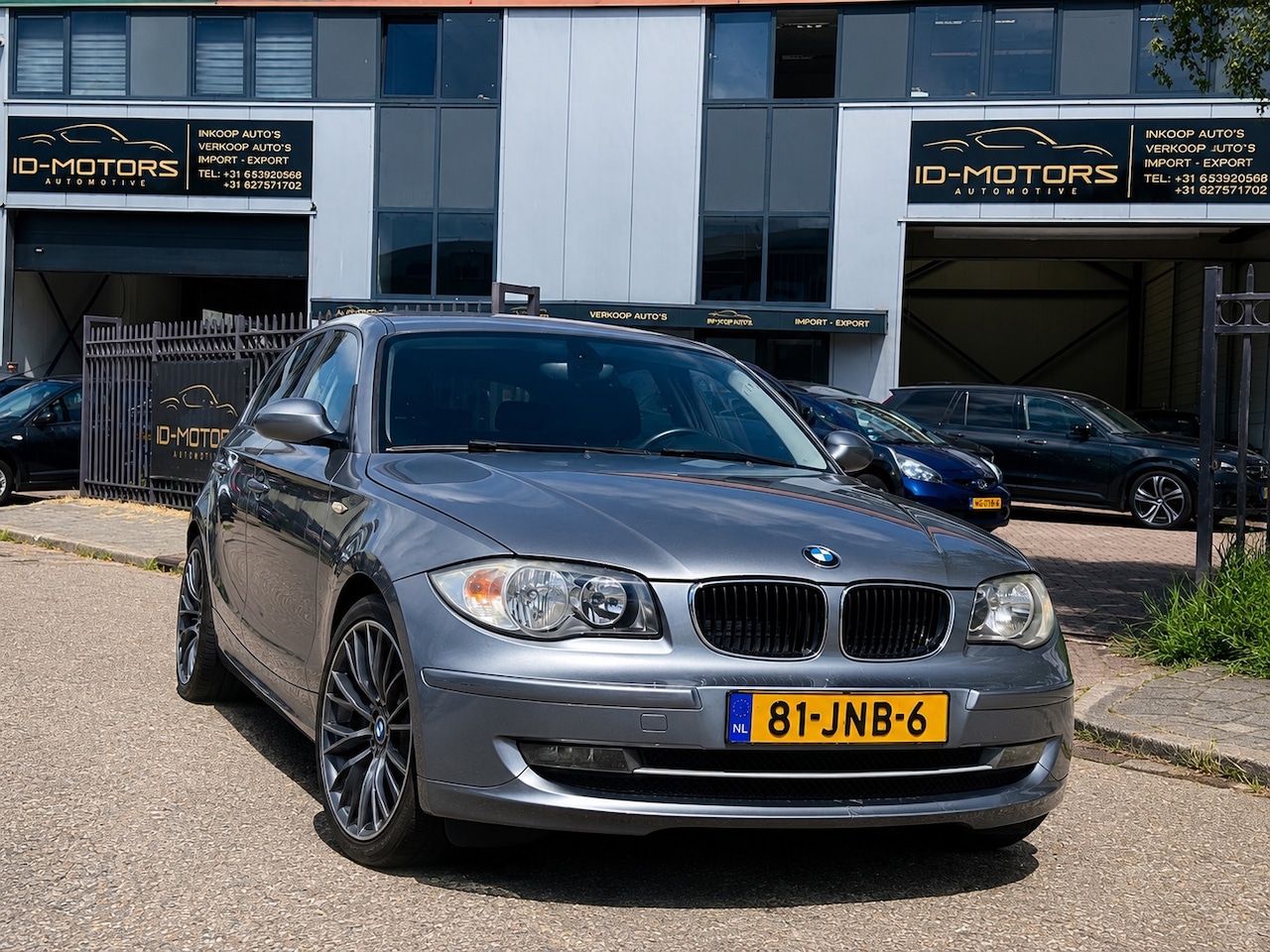 BMW 1-serie - 116i Business Line Luxe uitvoering sport - AutoWereld.nl