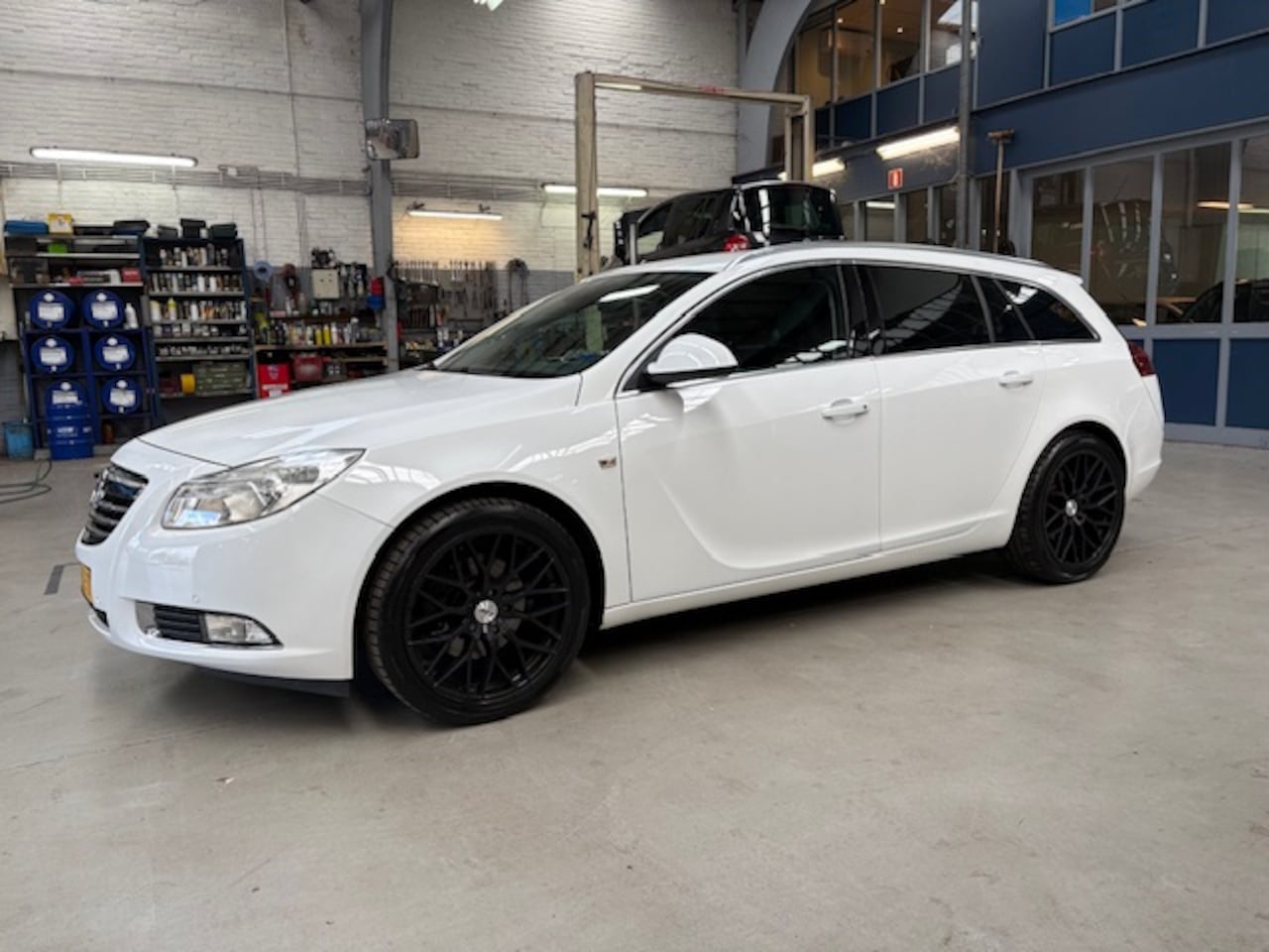 Opel Insignia - 1.6 Turbo 180pk Sport | Trekhaak | Navi | 19'' | Rijklaar prijs! - AutoWereld.nl
