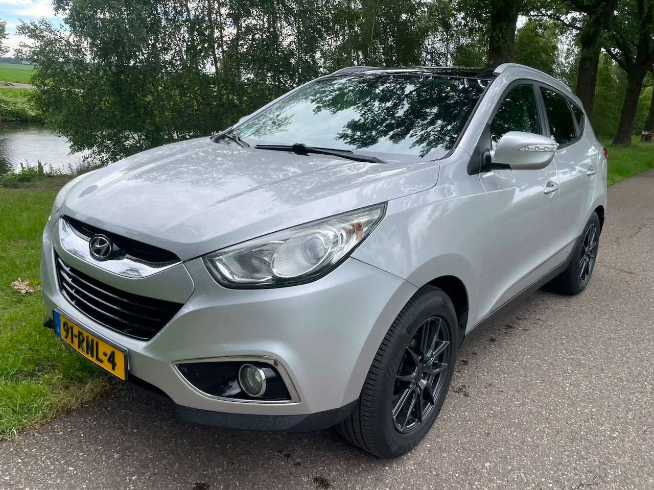 Hyundai ix35 - 2.0i 4WD Business Edition 2.0i 4WD Business Edition - AutoWereld.nl