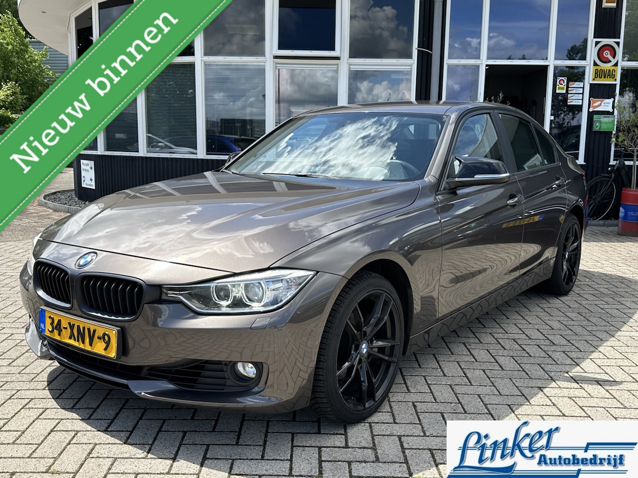 BMW 3-serie - 320i High Executive - NL-AUTO AUTOMAAT PDC ACHTER - AutoWereld.nl