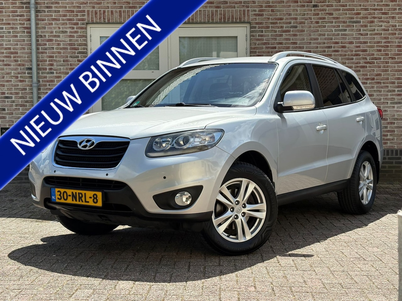 Hyundai Santa Fe - 2.4i CVVT Dynamic Clima Navi T.haak NAP - AutoWereld.nl