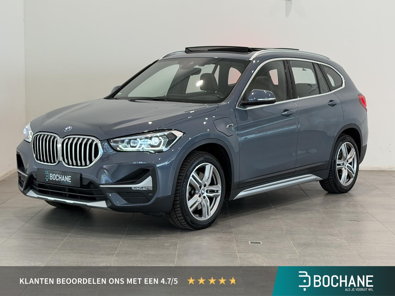 BMW X1 - xDrive25e High Executive X-Line | Leder | Panoramadak | Head-Up Display | Stoel- en stuurv - AutoWereld.nl