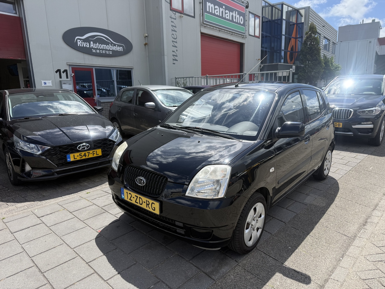 Kia Picanto - 1.0 Light 1.0 Light - AutoWereld.nl