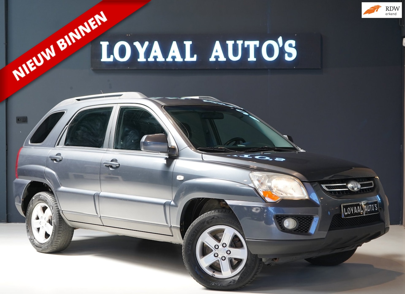 Kia Sportage - 2.0 CVVT X-tra | AIRCO | CRUISE | TREKHAAK | PDC | ELEK.RAMEN | NAP | APK. - AutoWereld.nl