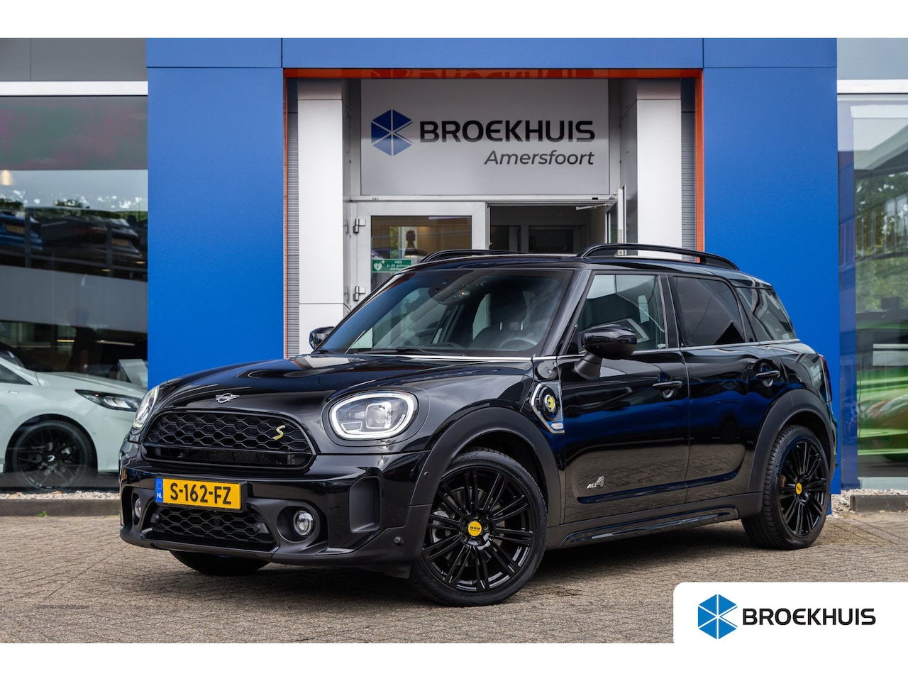 MINI Countryman - 1.5 Cooper S E ALL4 Chili 220pk | Adaptieve cruise control | 19'' | Stoelverwarming | Keyl - AutoWereld.nl