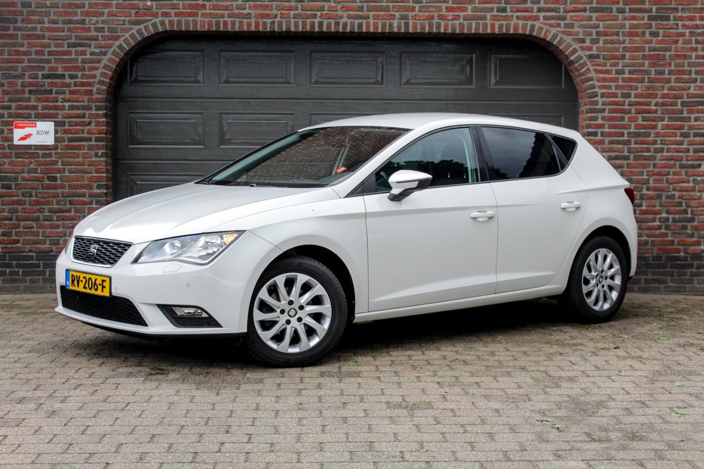 SEAT Leon - 1.2 TSI Style - automaat - cruise - stoelverwarming - AutoWereld.nl