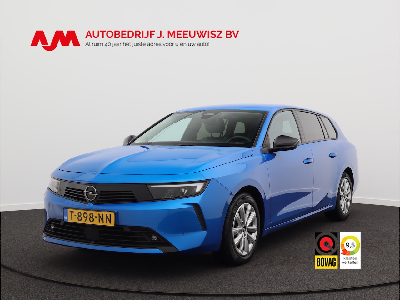 Opel Astra Sports Tourer - 1.2 Business Edition/ lage km/ zeer mooi! - AutoWereld.nl