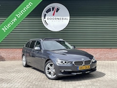 BMW 3-serie Touring - 328i Luxury / ZWITSERS / PANORAMA / DAB