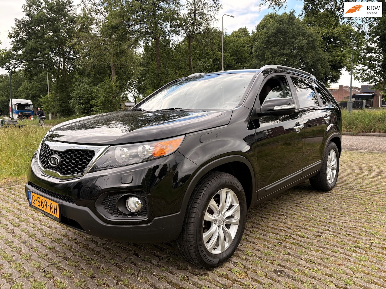 Kia Sorento - 2.4 X-clusive 7p. - airco - leder - stoelverwarming - AutoWereld.nl