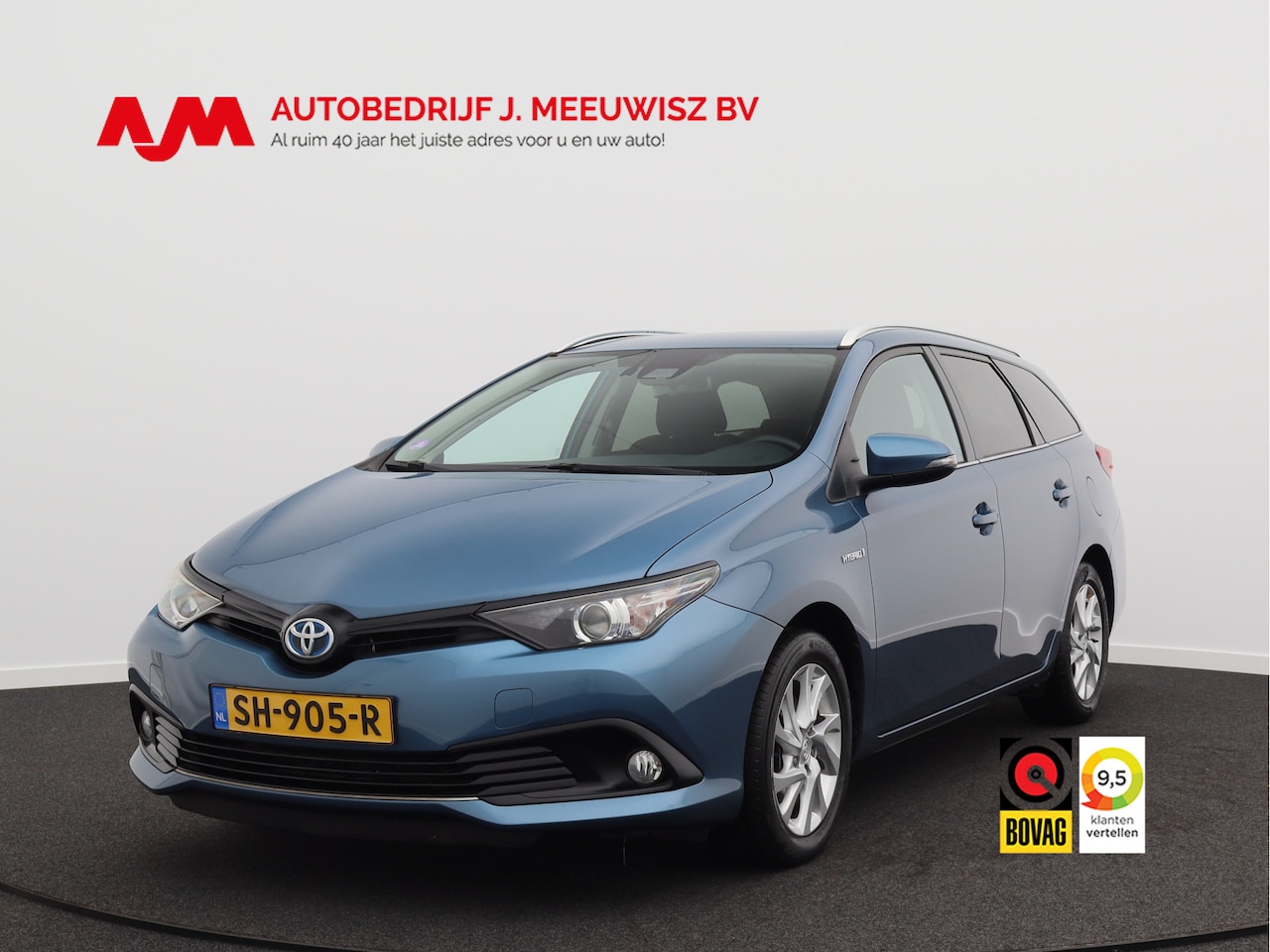 Toyota Auris - 1.8 Hybrid Dynamic/ lage km/ zeer mooi! - AutoWereld.nl