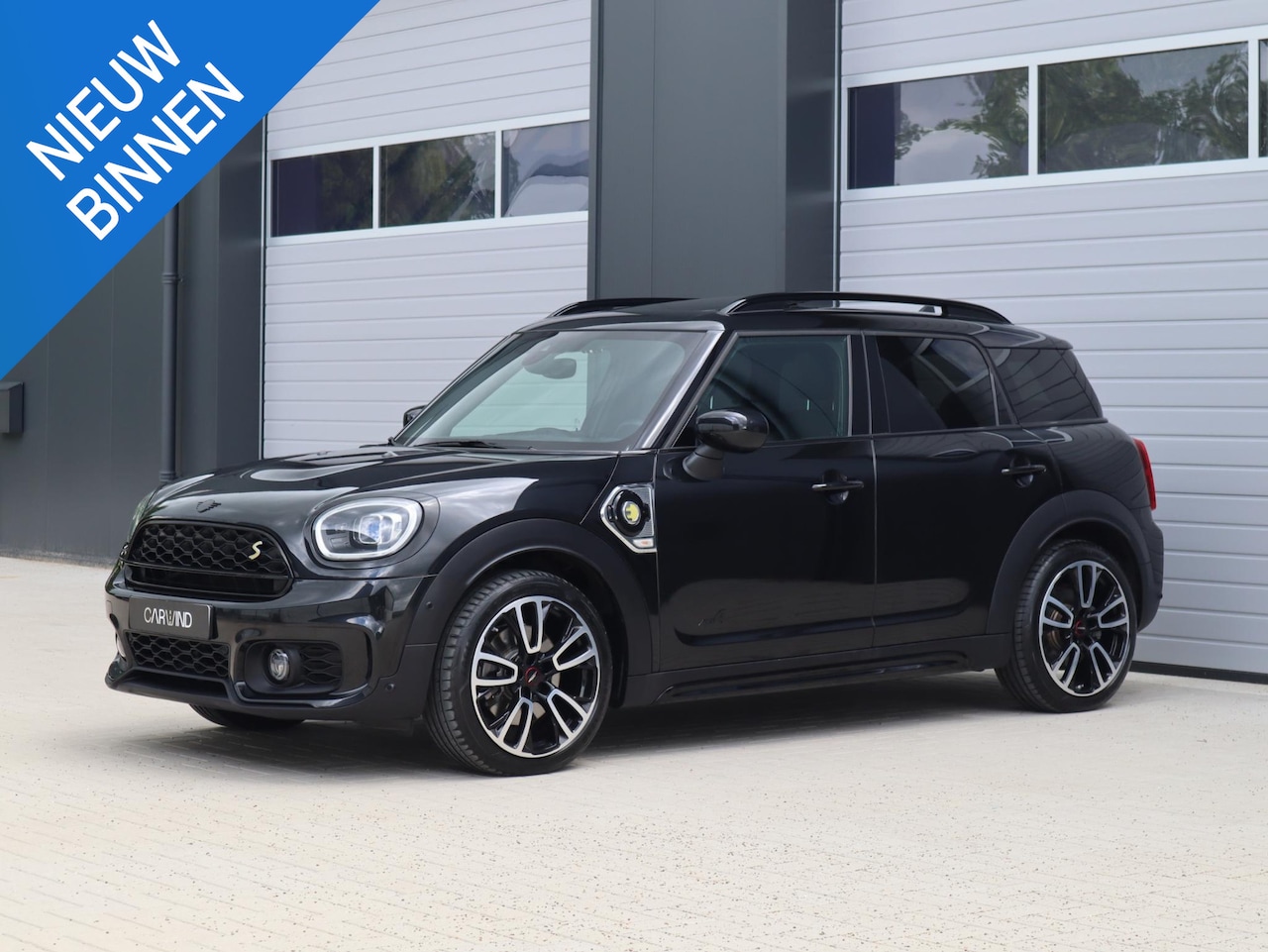 MINI Countryman - 1.5 Cooper SE ALL4 JCW | Panoramadak | HUD | UNIEK - AutoWereld.nl
