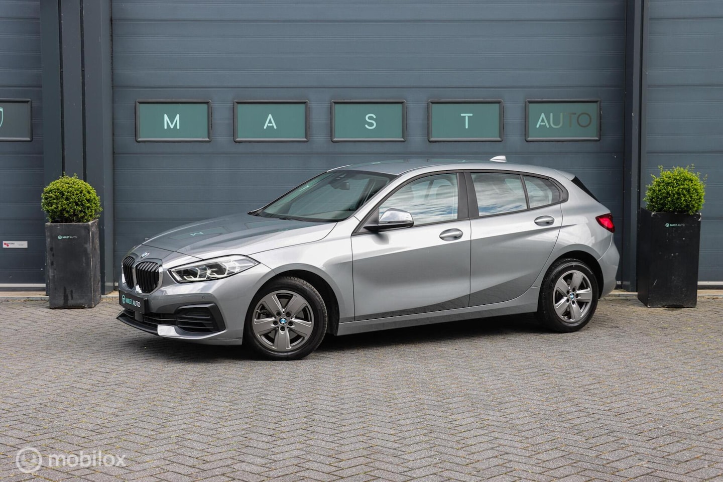 BMW 1-serie - 116i AUT|LED|Sportstoelen|PDC|Cruisecontrol - AutoWereld.nl