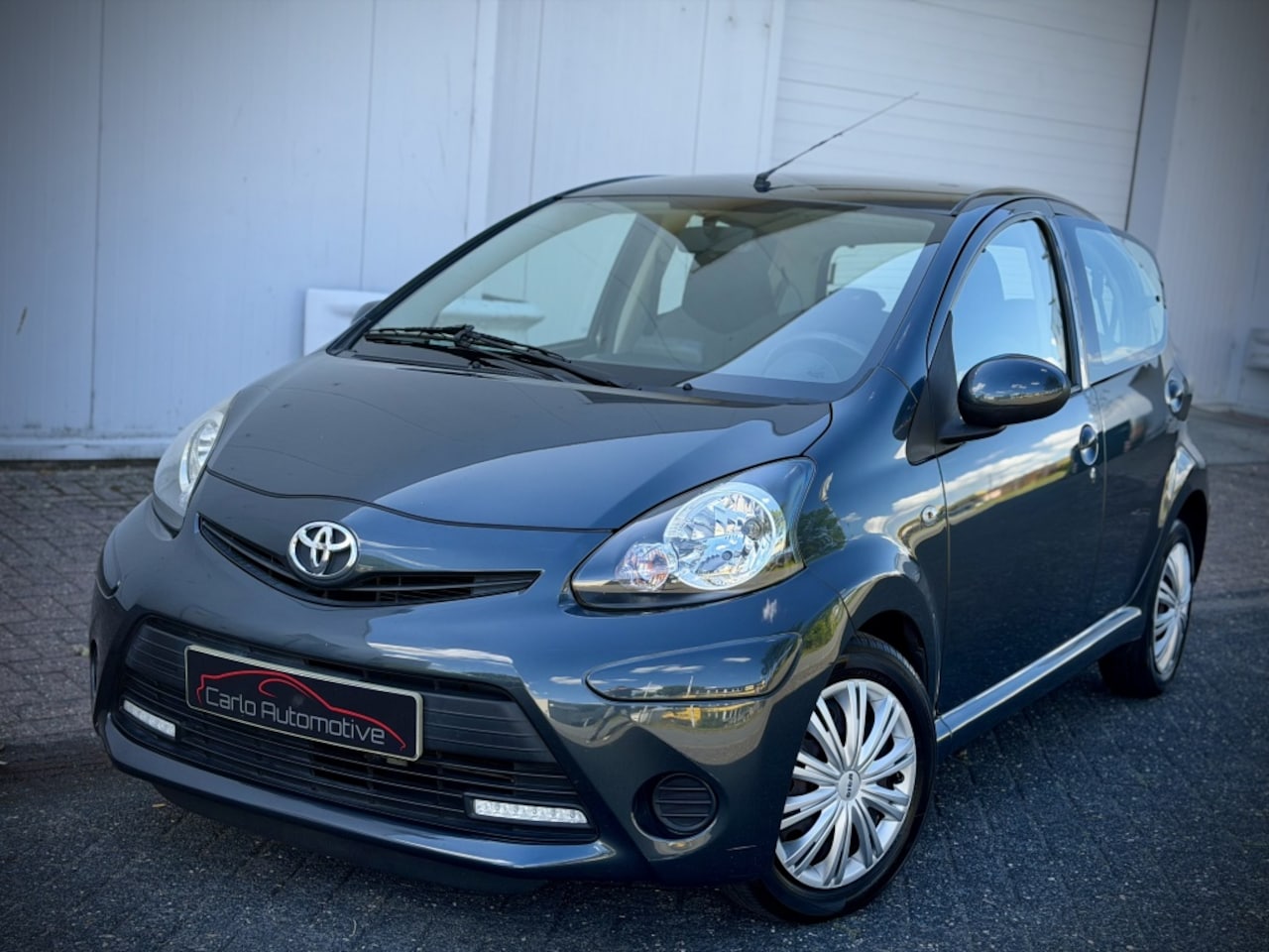 Toyota Aygo - 1.0 VVT-i Aspiration AUTOMAAT|AIRCO|NAVIGATIE|BLUETOOTH - AutoWereld.nl
