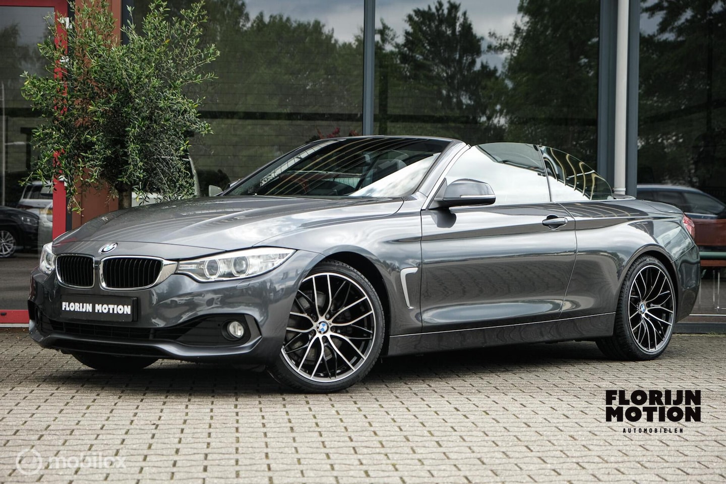 BMW 4-serie Cabrio - 428i Sport | 19 Inch | Stoelverwarming | Mineral Grau | Cruise | Lage KM | Hardtop | Trekh - AutoWereld.nl