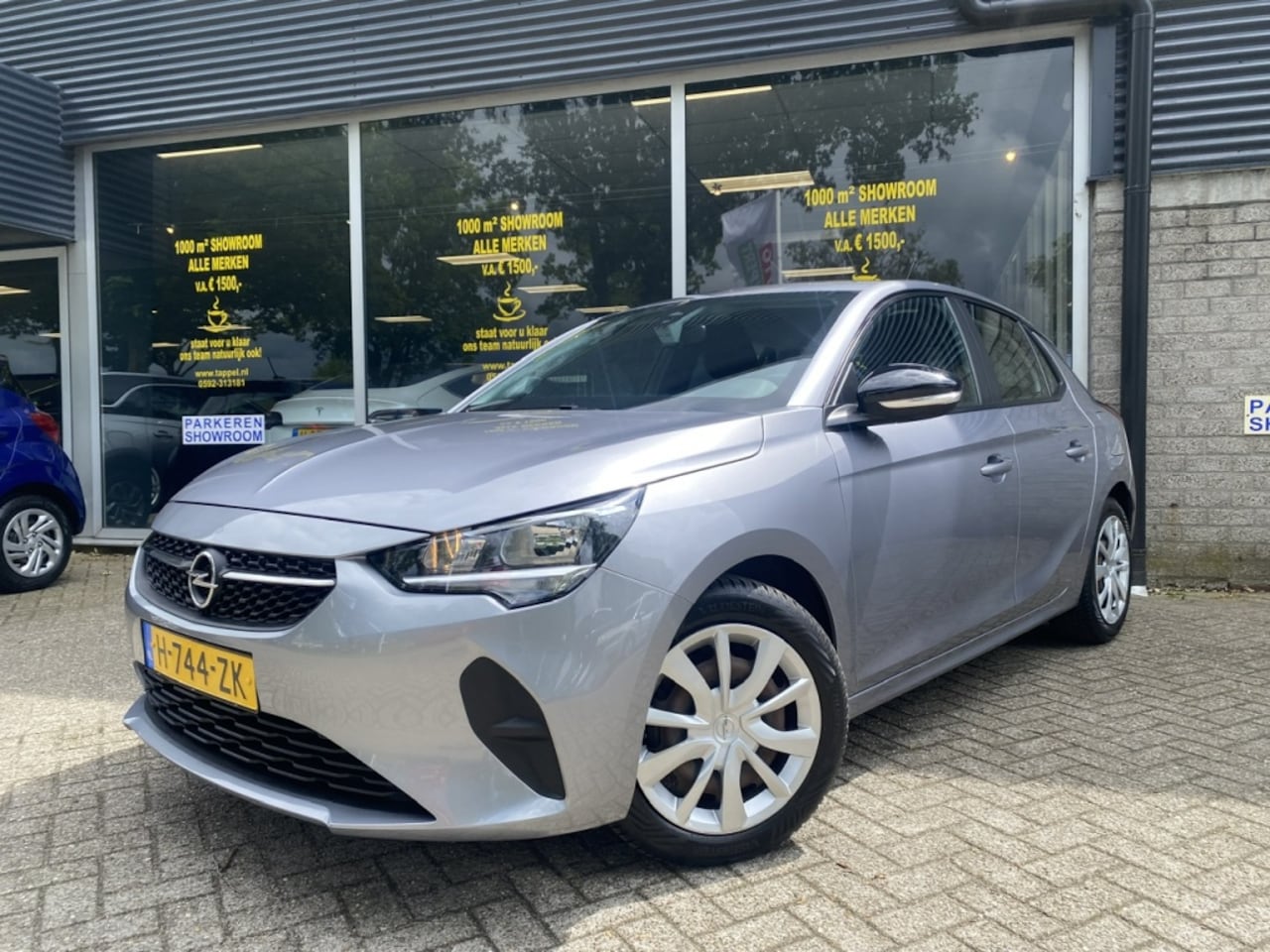 Opel Corsa - 1.2 Edition Cruise/PDC - AutoWereld.nl