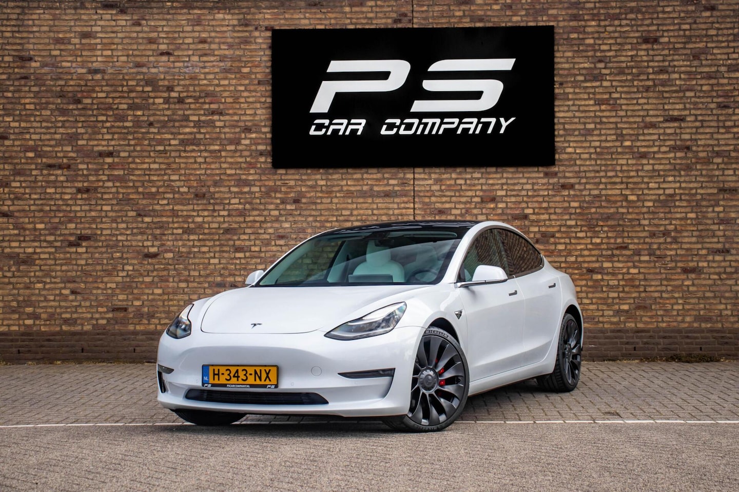 Tesla Model 3 - Long Range RWD Long Range AWD 75 kWh, NAP, Leder, Pano, ACC - AutoWereld.nl