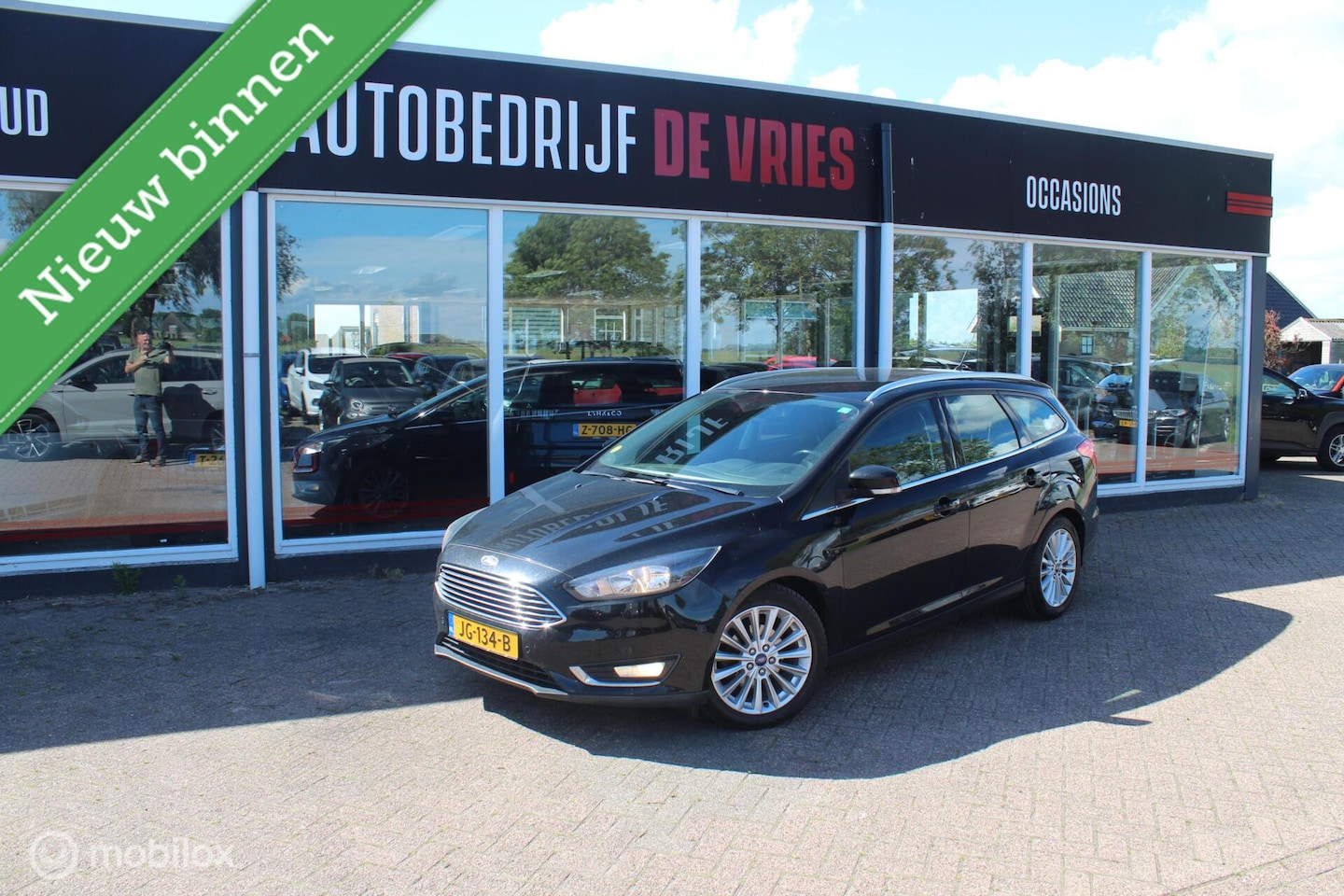 Ford Focus Wagon - 1.5 TDCI Titanium Clima/Cruise/Navi/Trekhaak - AutoWereld.nl